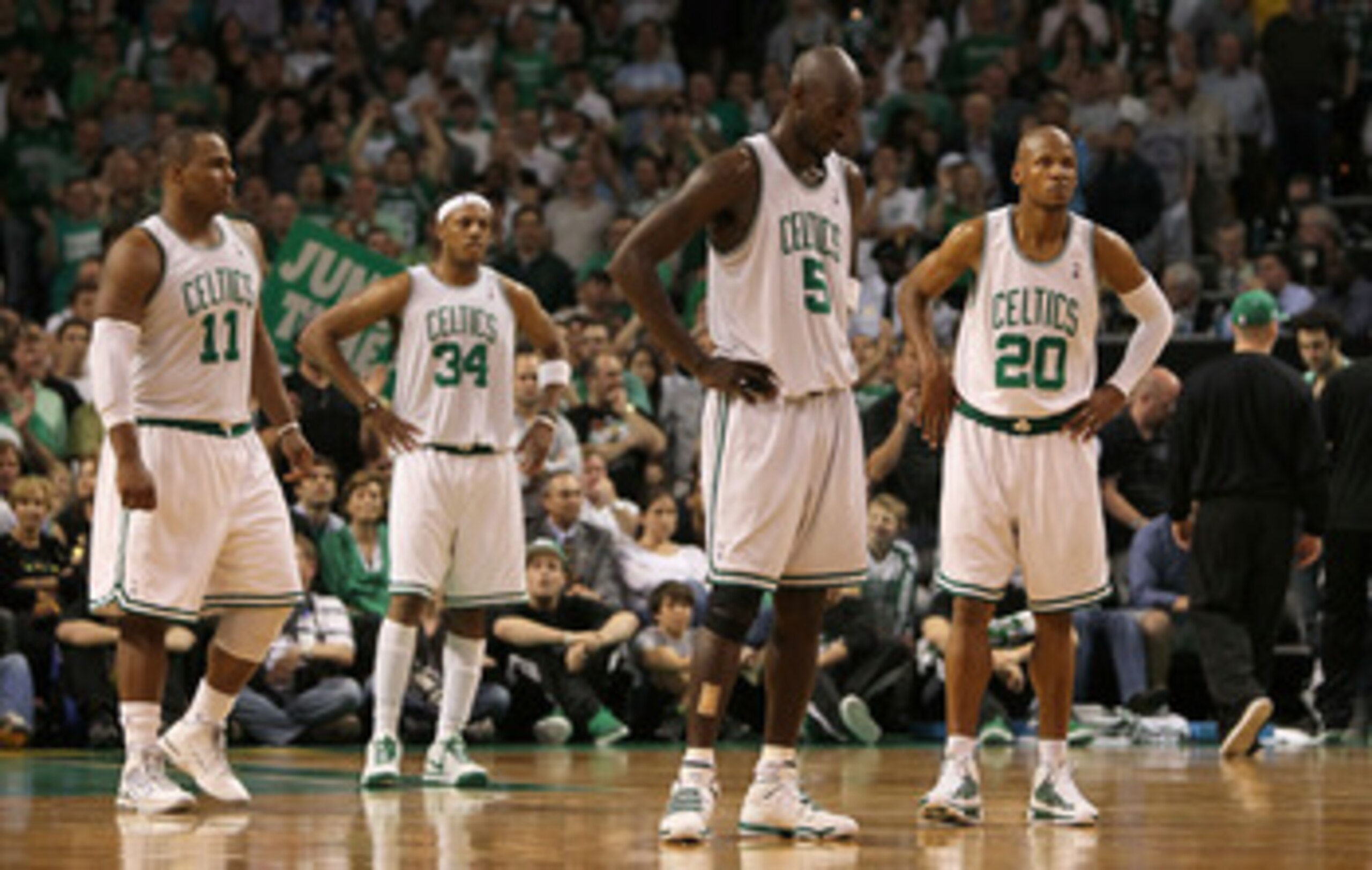BOSTON - MAY 24:  (L-R) Glen Davis #11, Paul Pierce #34, Kevin Garnett #5 and Ray Allen #20 of the Boston Celtics stand on court late in the game against the Orlando Magic in Game Four of the Eastern Conference Finals during the 2010 NBA Playoffs at TD Ba