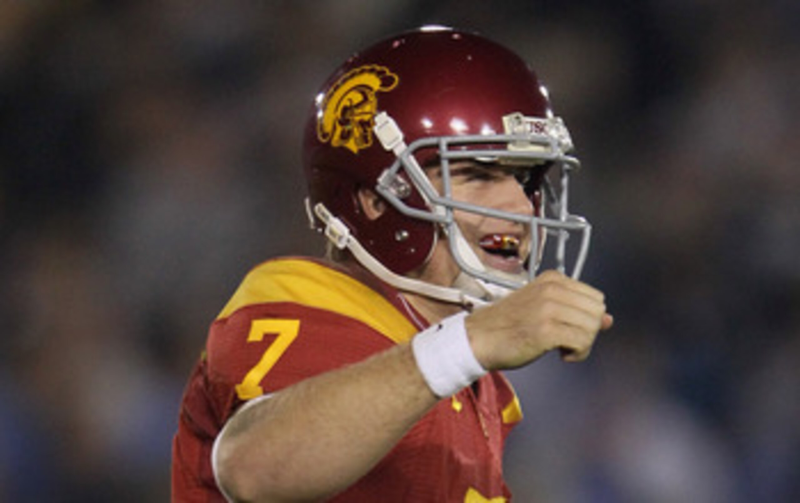 PASADENA, CA - DECEMBER 04:  Quarterback Matt Barkley #7 of the USC Trojans celebrates following a touchdown by running back Allen Bradford (not pictured) late in the second half against the UCLA Bruins at the Rose Bowl on December 4, 2010 in Pasadena, Ca