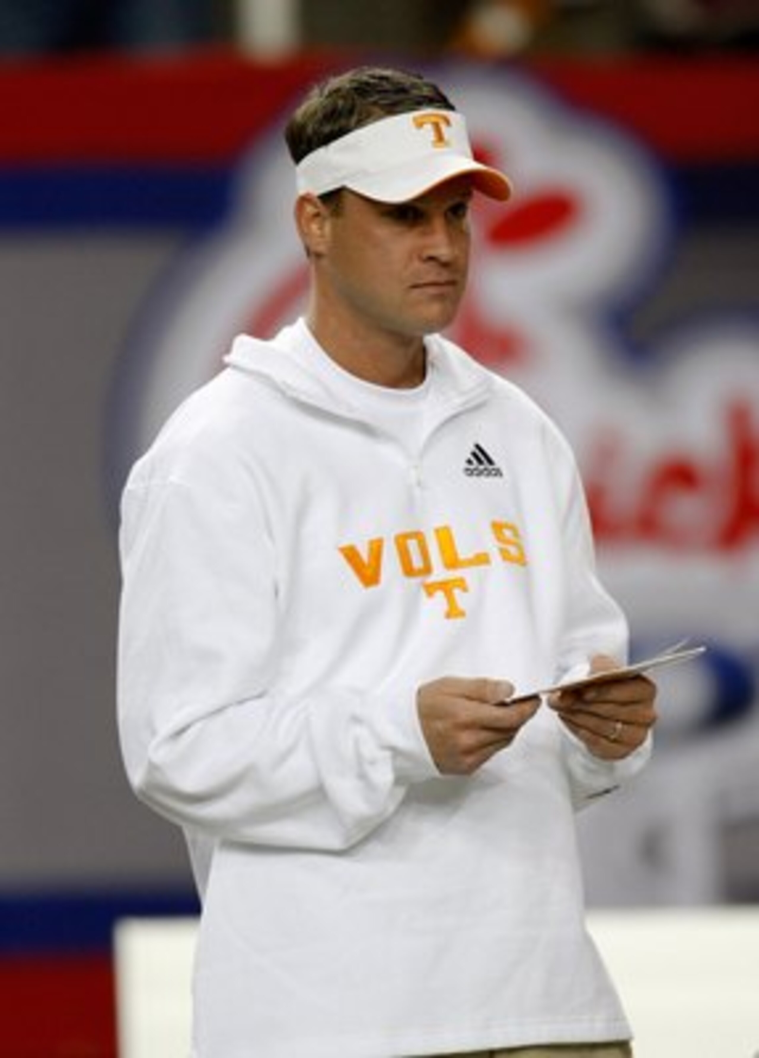 ATLANTA - DECEMBER 31:  Tennessee Volunteers head coach Lane Kiffin watches warmups on the field before the Chick-Fil-A Bowl against the Virginia Tech Hokies at the Georgia Dome on December 31, 2009 in Atlanta, Georgia.  Virginia Tech beat Tennessee 37-14