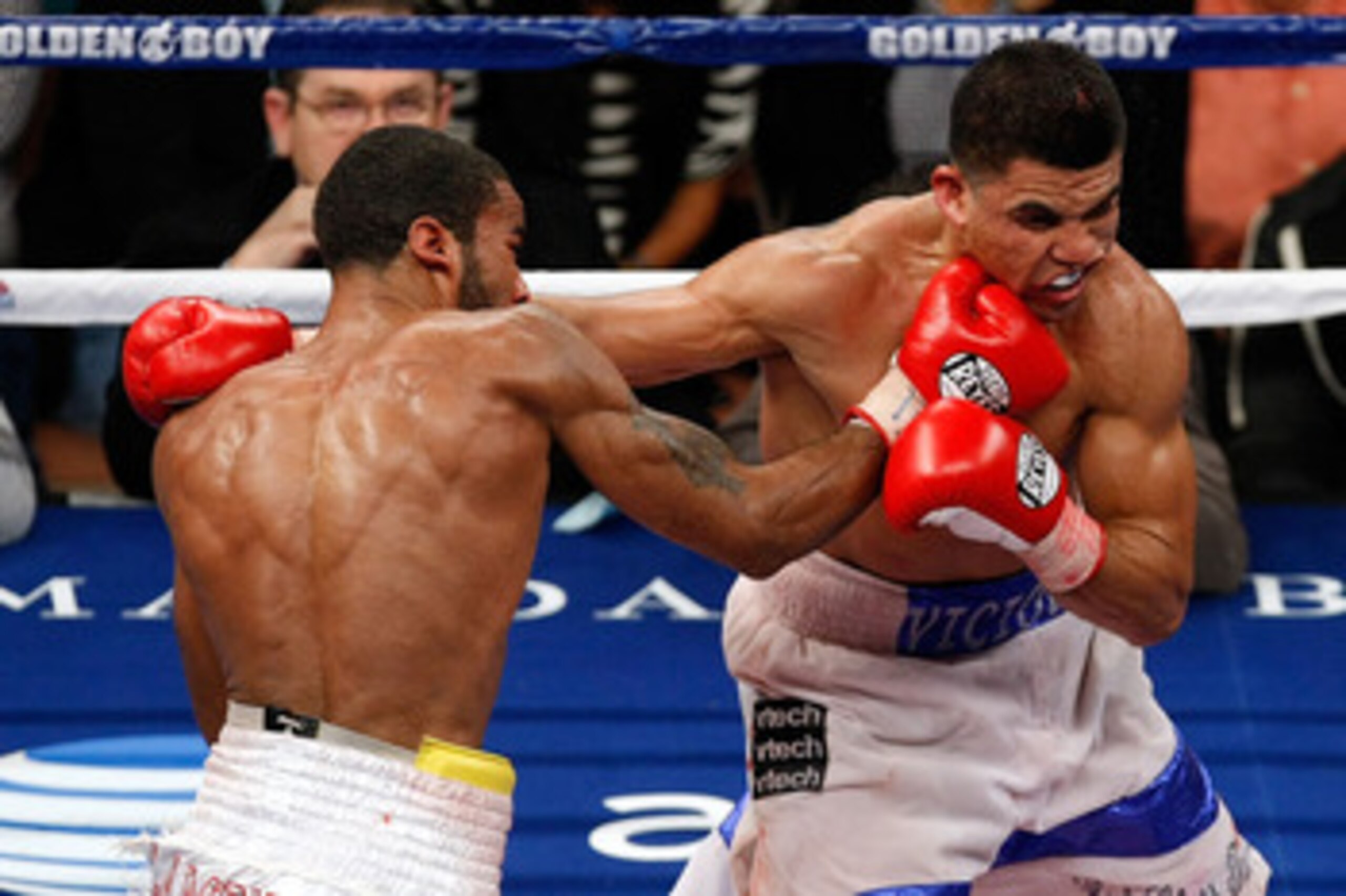 LAS VEGAS - DECEMBER 11:  (L-R) Lamont Petersen connects to the face of Victor Ortiz during the super lightweight fight at Mandalay Bay Events Center on December 11, 2010 in Las Vegas, Nevada.  (Photo by Ethan Miller/Getty Images)