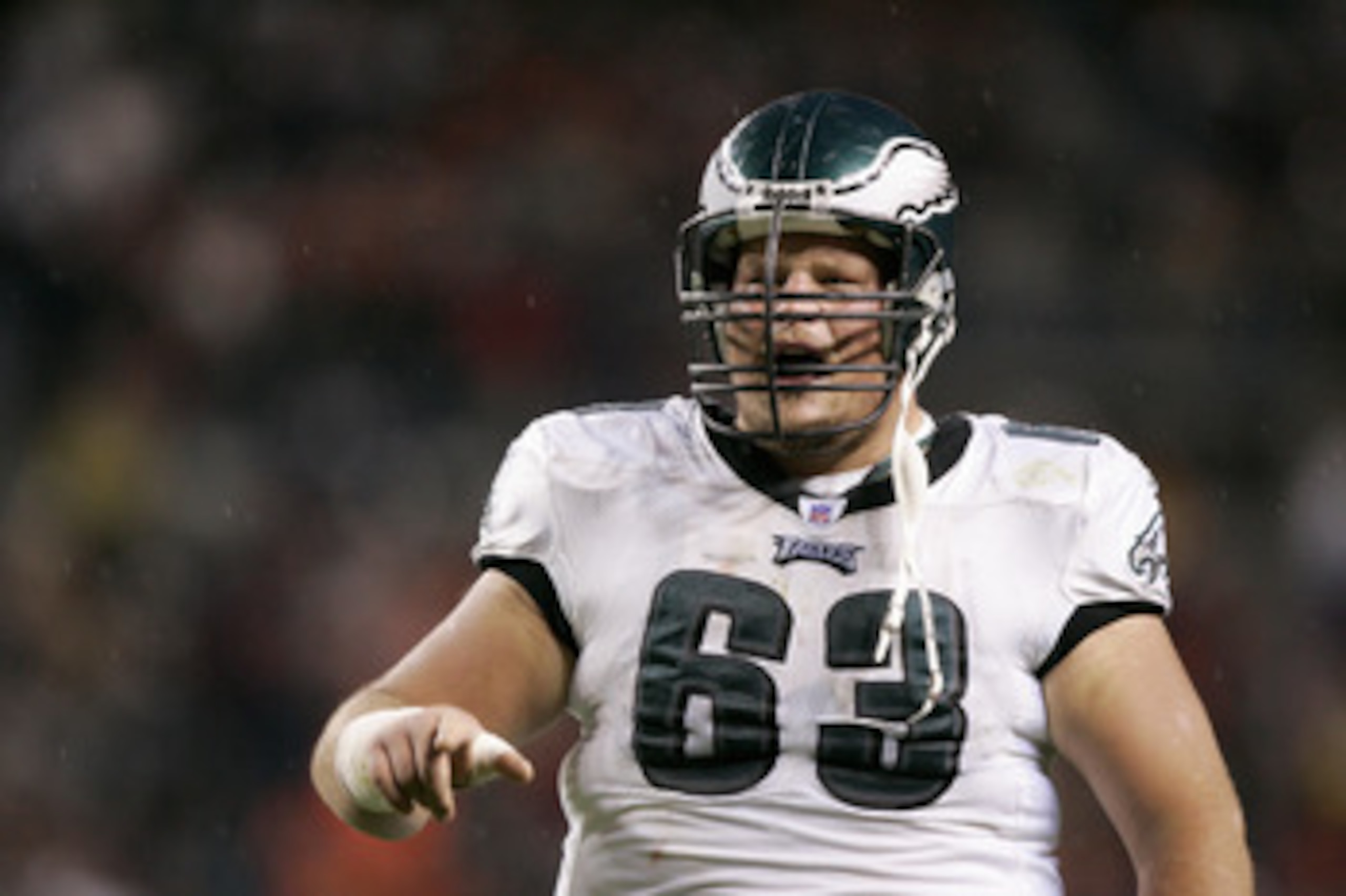 DENVER - OCTOBER 30:  Hank Fraley #63 of the Philadelphia Eagles yells on the field during the game against the Denver Broncos on October 30, 2005 at Invesco Field at Mile High in Denver, Colorado.  The Broncos won 49-21.  (Photo by Brian Bahr/Getty Image