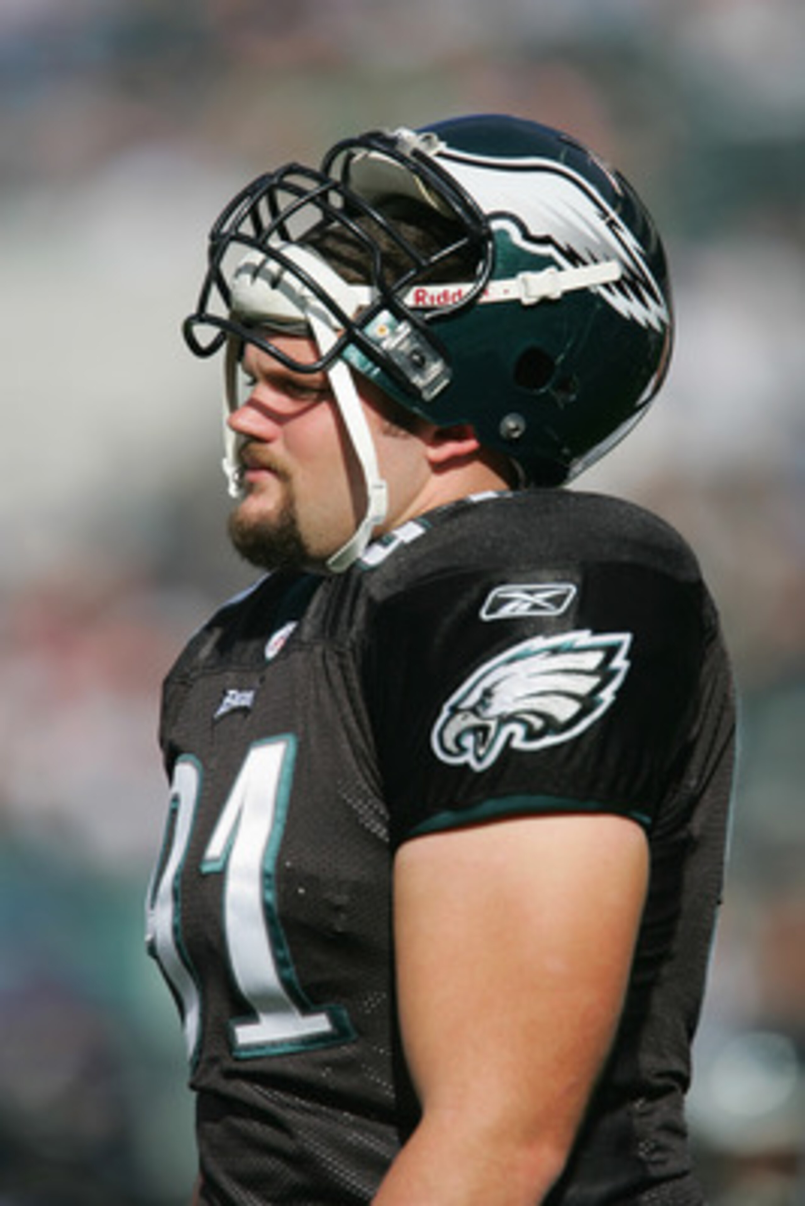 PHILADELPHIA - OCTOBER 31:  Defensive tackle Sam Rayburn #91 of the Philadelphia Eagles watches the game against the Baltimore Ravens at Lincoln Financial Field on October 31, 2004 in Philadelphia, Pennsylvania. The Eagles defeated the Ravens 15-10. (Phot