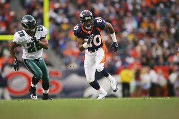 DENVER - OCTOBER 30:  Wide receiver Rod Smith #80 of the Denver Broncos runs a pass pattern against cornerback Roderick Hood #29 of the Philadelphia Eagles at INVESCO Field at Mile High on October 30, 2005 in Denver, Colorado. The Broncos defeated the Eag