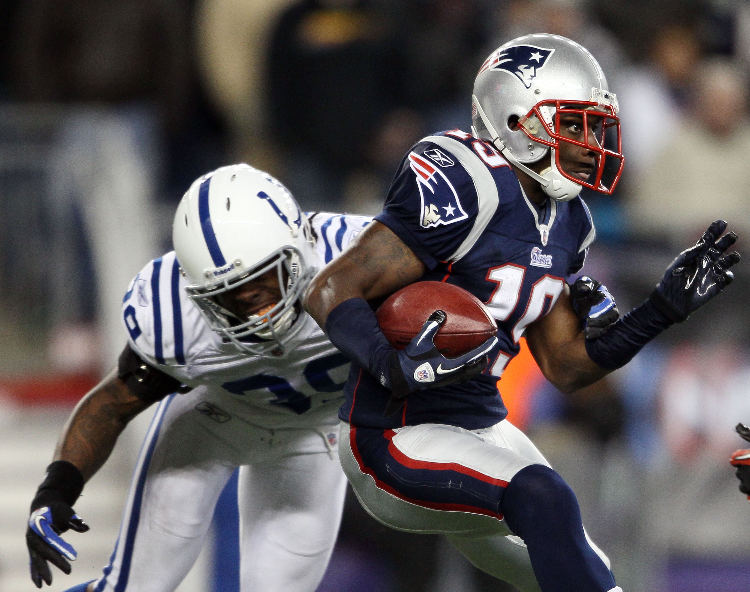FOXBORO, MA - NOVEMBER 21:   Brandon Tate #19 of the New England Patriots carries the ball as Cornelius Brown #39 of the Indianapolis Colts defends on November 21, 2010 at Gillette Stadium in Foxboro, Massachusetts. (Photo by Elsa/Getty Images)