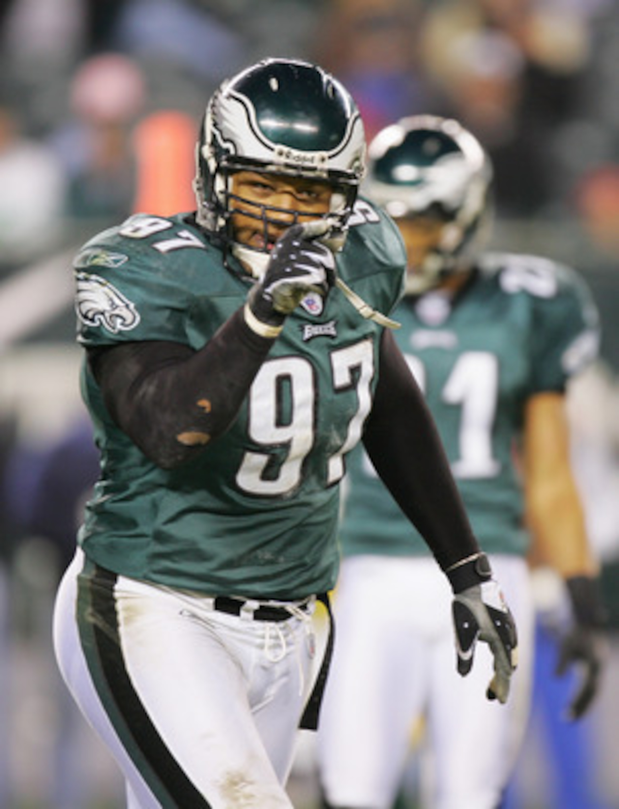PHILADELPHIA - DECEMBER 5:  Darwin Walker #97 of the Philadelphia Eagles gestures on the field during the game against the Green Bay Packers at Lincoln Financial Field on December 5, 2004 in Philadelphia, Pennsylvania. The Eagles defeated the Packers 47-1