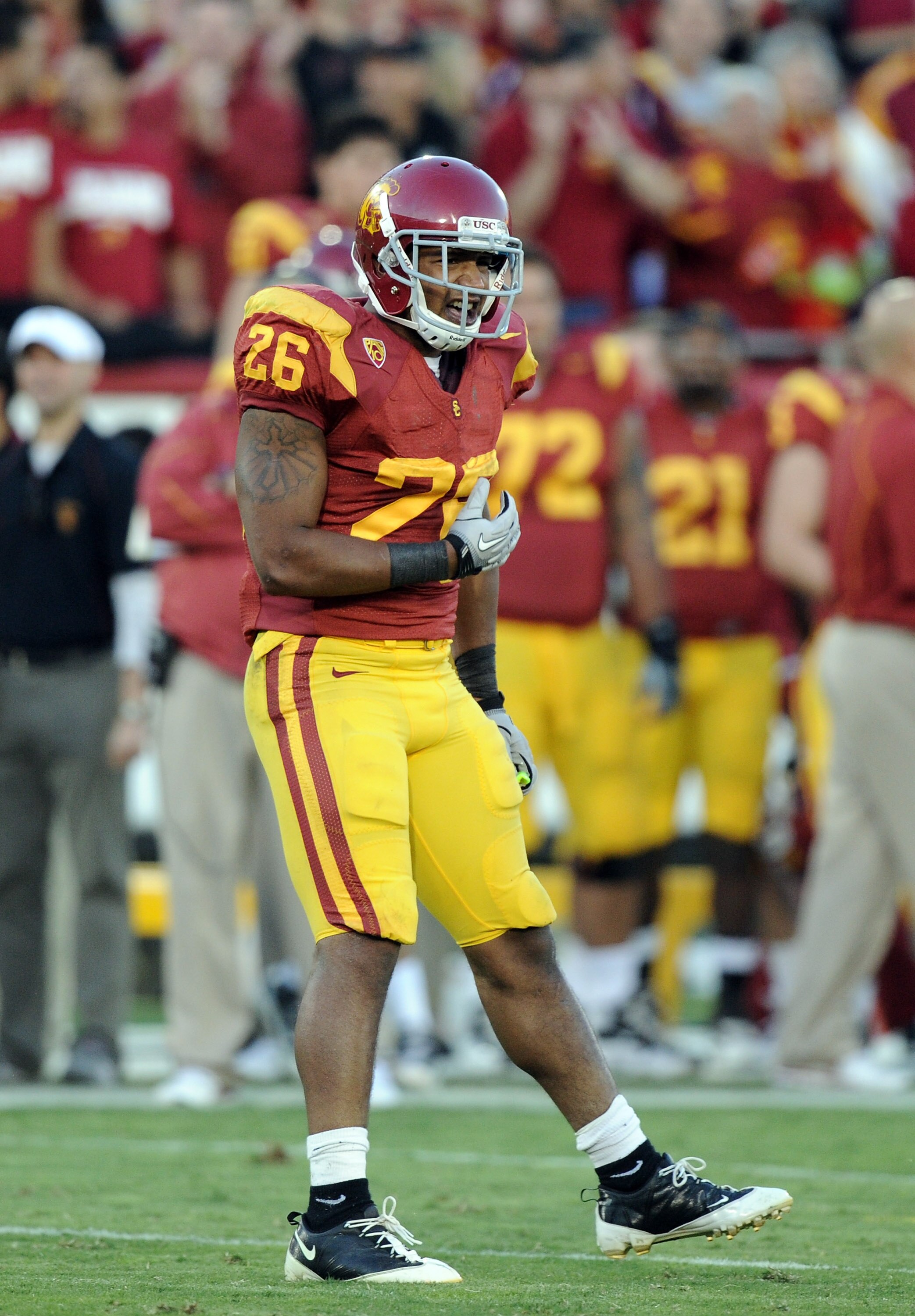 LOS ANGELES, CA - OCTOBER 30:  Marc Tyler #26 of the USC Trojans celebrates his touchdown against the Oregon Ducks at Los Angeles Memorial Coliseum on October 30, 2010 in Los Angeles, California.  (Photo by Harry How/Getty Images)