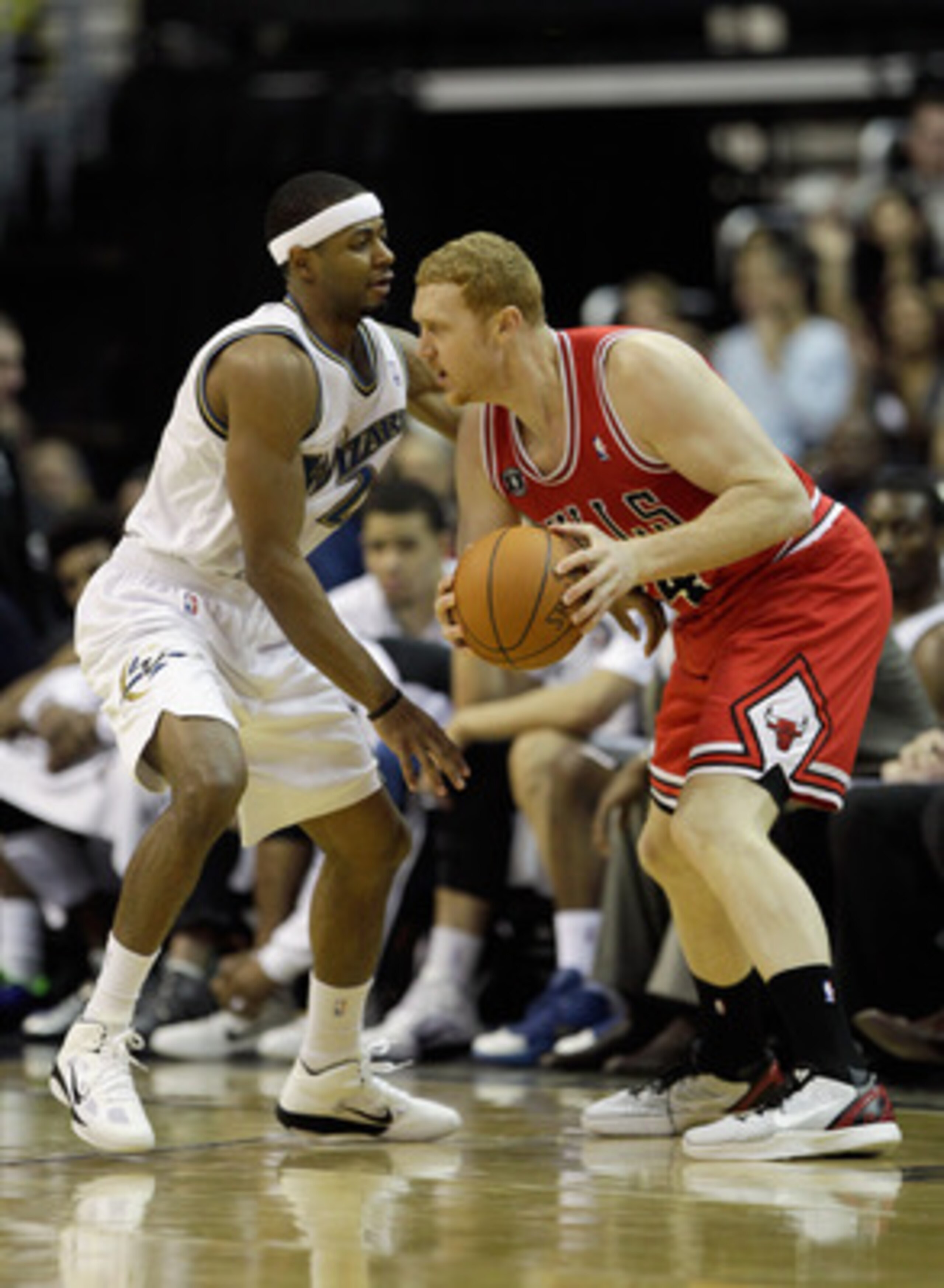 WASHINGTON, DC - FEBRUARY 28: Brian Scalabrine #24 of the Chicago Bulls and Mustafa Shakur #22 of the Washington Wizards at the Verizon Center in Washington on February 28, 2011 in Washington, DC. NOTE TO USER: User expressly acknowledges and agrees that,