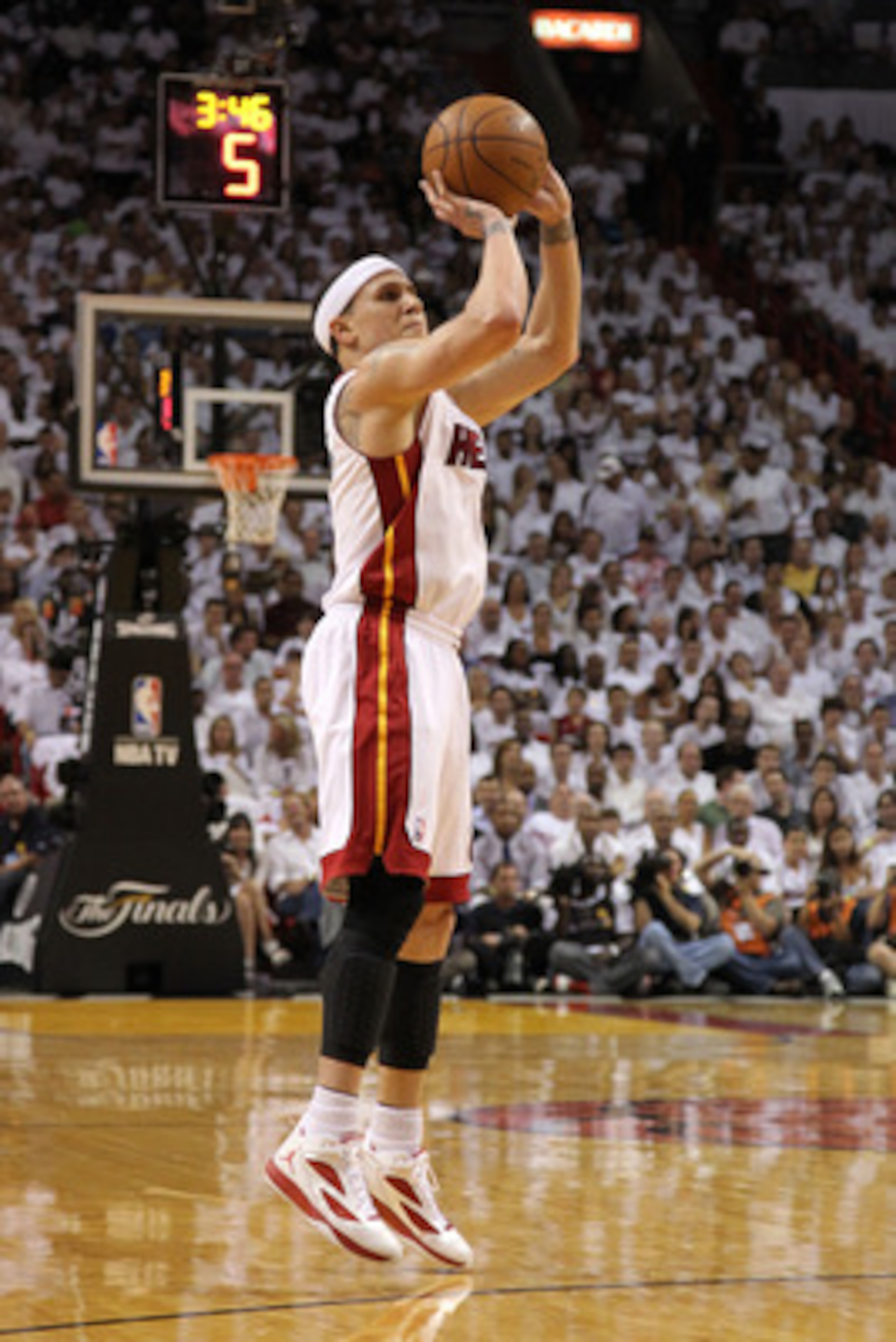 MIAMI, FL - JUNE 02:  Mike Bibby #0 of the Miami Heat attempts a shot against the Dallas Mavericks in Game Two of the 2011 NBA Finals at American Airlines Arena on June 2, 2011 in Miami, Florida. NOTE TO USER: User expressly acknowledges and agrees that, 