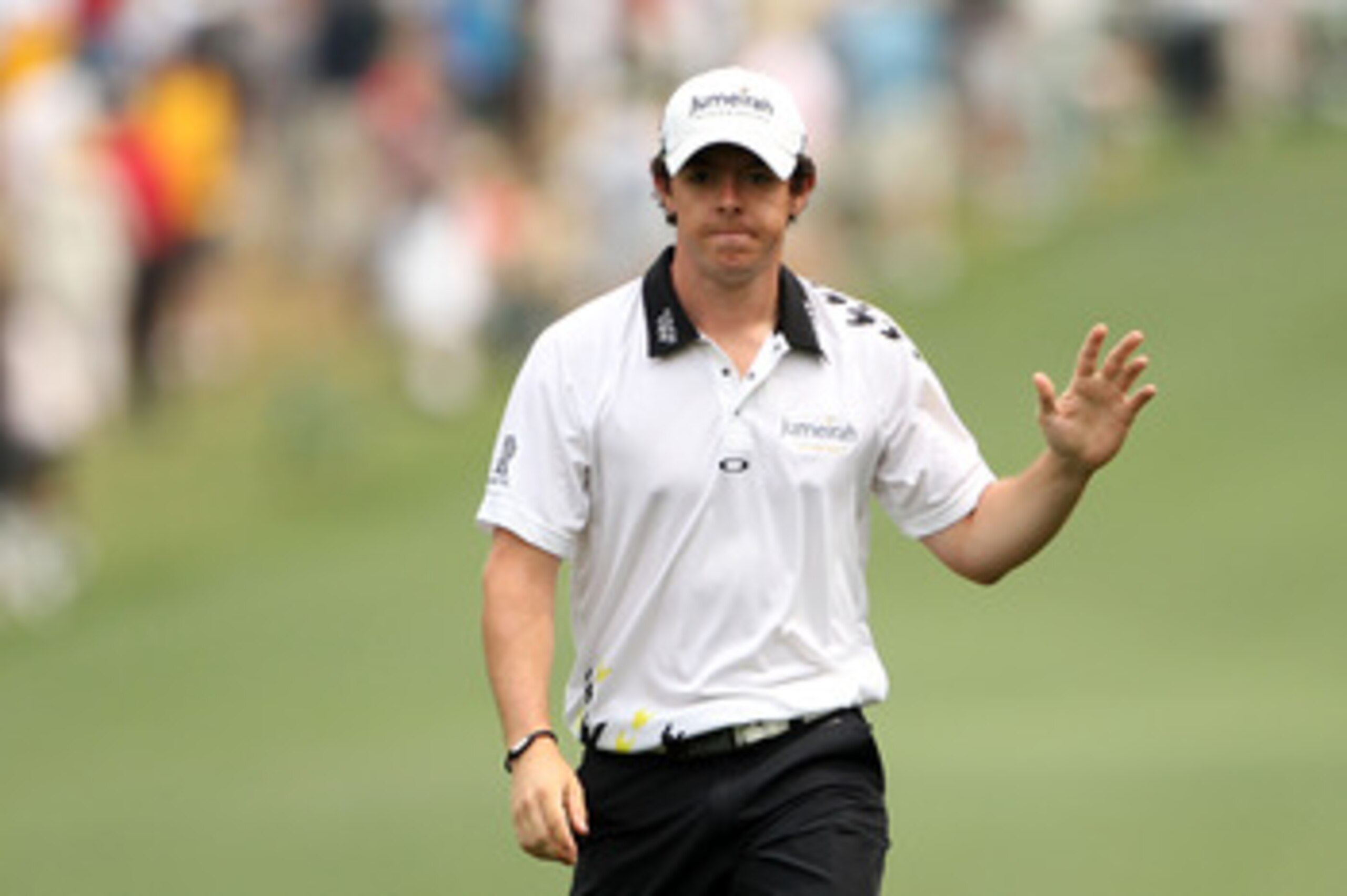 AUGUSTA, GA - APRIL 09:  Rory McIlroy of Northern Ireland waves to fans during the third round of the 2011 Masters Tournament at Augusta National Golf Club on April 9, 2011 in Augusta, Georgia.  (Photo by Andrew Redington/Getty Images)