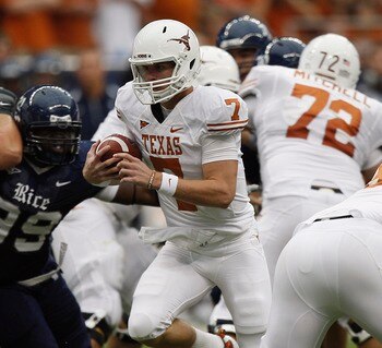 HOUSTON - SEPTEMBER 04: Quarterback Garrett Gilbert #7 of the Texas Longhorns during game action against the Rice Owls at Reliant Stadium on September 4, 2010 in Houston, Texas. Texas won 34-17. (Photo by Bob Levey/Getty Images) HOUSTON - SEPTEMBER 04: Quarterback Garrett Gilbert #7 of the Texas Longhorns during game action against the Rice Owls at Reliant Stadium on September 4, 2010 in Houston, Texas. Texas won 34-17. (Photo by Bob Levey/Getty Images)