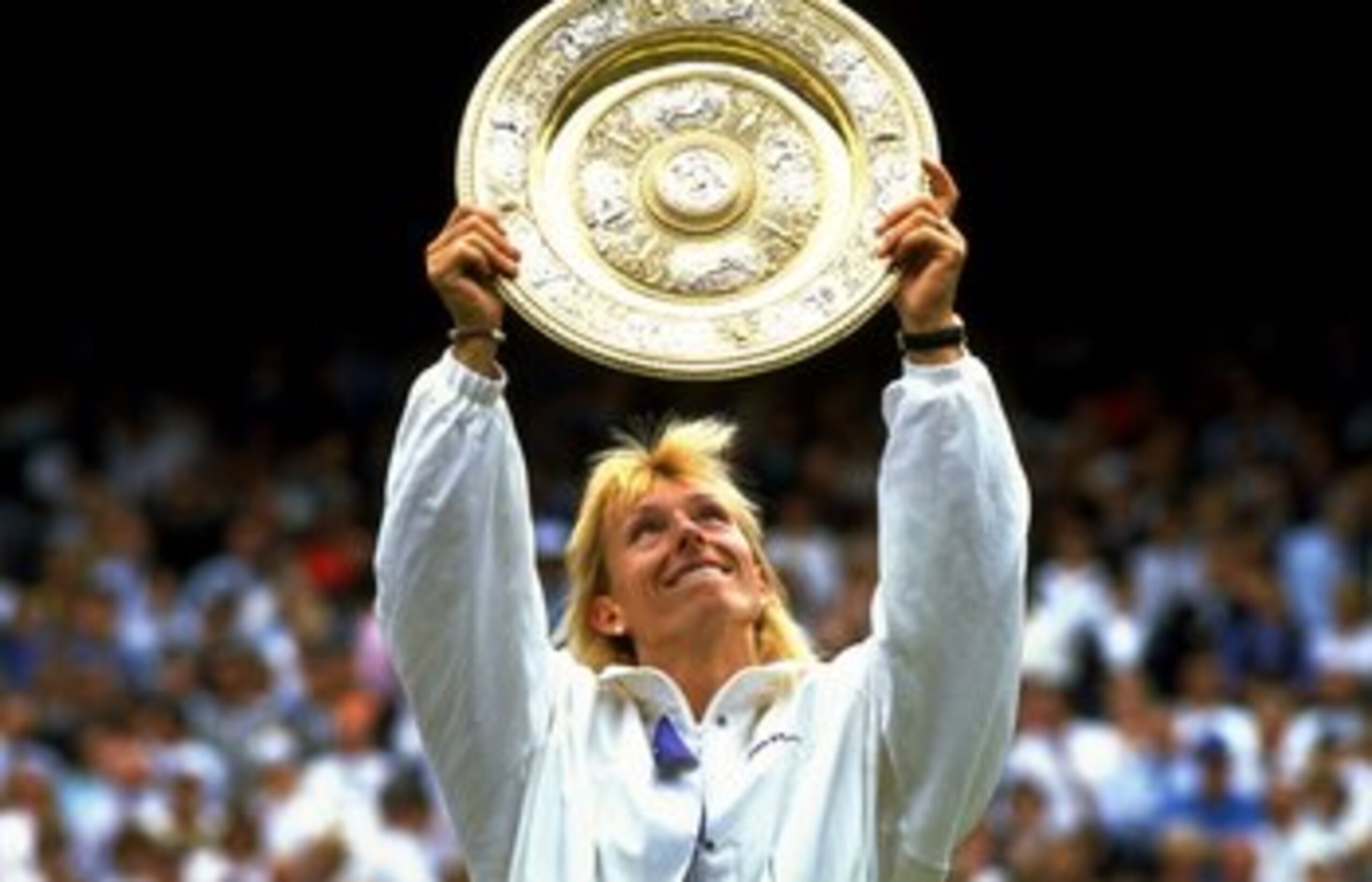 Jul 1990:  Martina Navratilova of the USA holds up the winners'' plate after winning the Wimbledon Championships played at Wimbledon, London, England.  \ Mandatory Credit: Allsport UK /Allsport