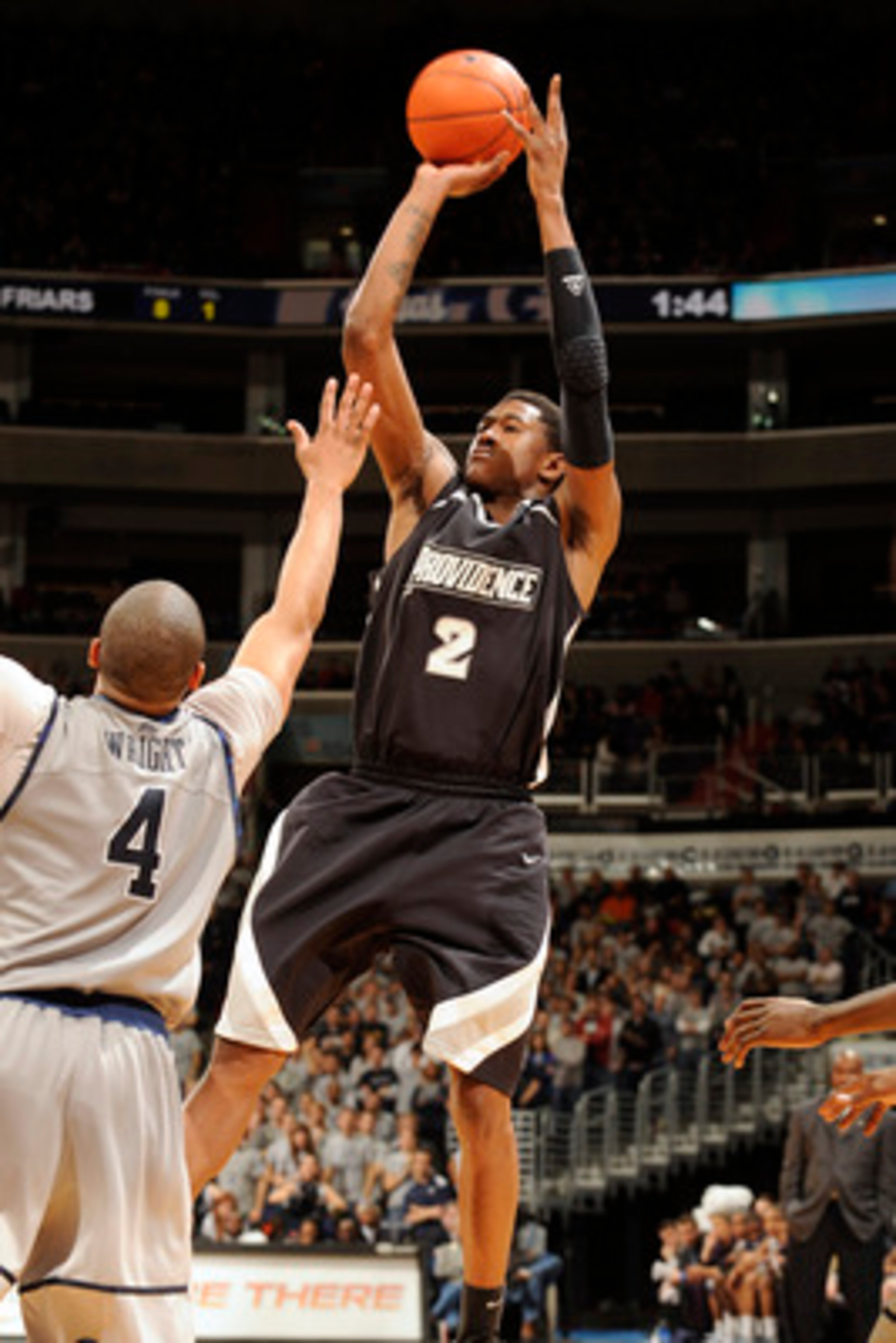 WASHINGTON, DC - FEBRUARY 5: Marshon Brooks #2 of the Providence Friars takes a jump shot over Chris Wright #4 of the Georgetown Hoays during a college basketball game on February 5, 2011 at the Verizon Center in Washington, DC. The Hoyas won 83-81. (P WASHINGTON, DC - FEBRUARY 5: Marshon Brooks #2 of the Providence Friars takes a jump shot over Chris Wright #4 of the Georgetown Hoays during a college basketball game on February 5, 2011 at the Verizon Center in Washington, DC. The Hoyas won 83-81. (P