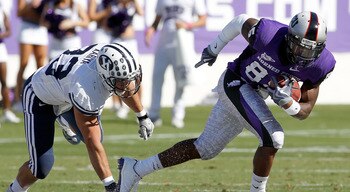 FORT WORTH, TX - OCTOBER 16: Wide receiver Jeremy Kerley #85 of the TCU Horned Frogs carries the ball against defensice back Bryan Kariya #33 of the BYU Cougars at Amon G. Carter Stadium on October 16, 2010 in Fort Worth, Texas. TCU beat BYU 31-3. (Pho FORT WORTH, TX - OCTOBER 16: Wide receiver Jeremy Kerley #85 of the TCU Horned Frogs carries the ball against defensice back Bryan Kariya #33 of the BYU Cougars at Amon G. Carter Stadium on October 16, 2010 in Fort Worth, Texas. TCU beat BYU 31-3. (Pho
