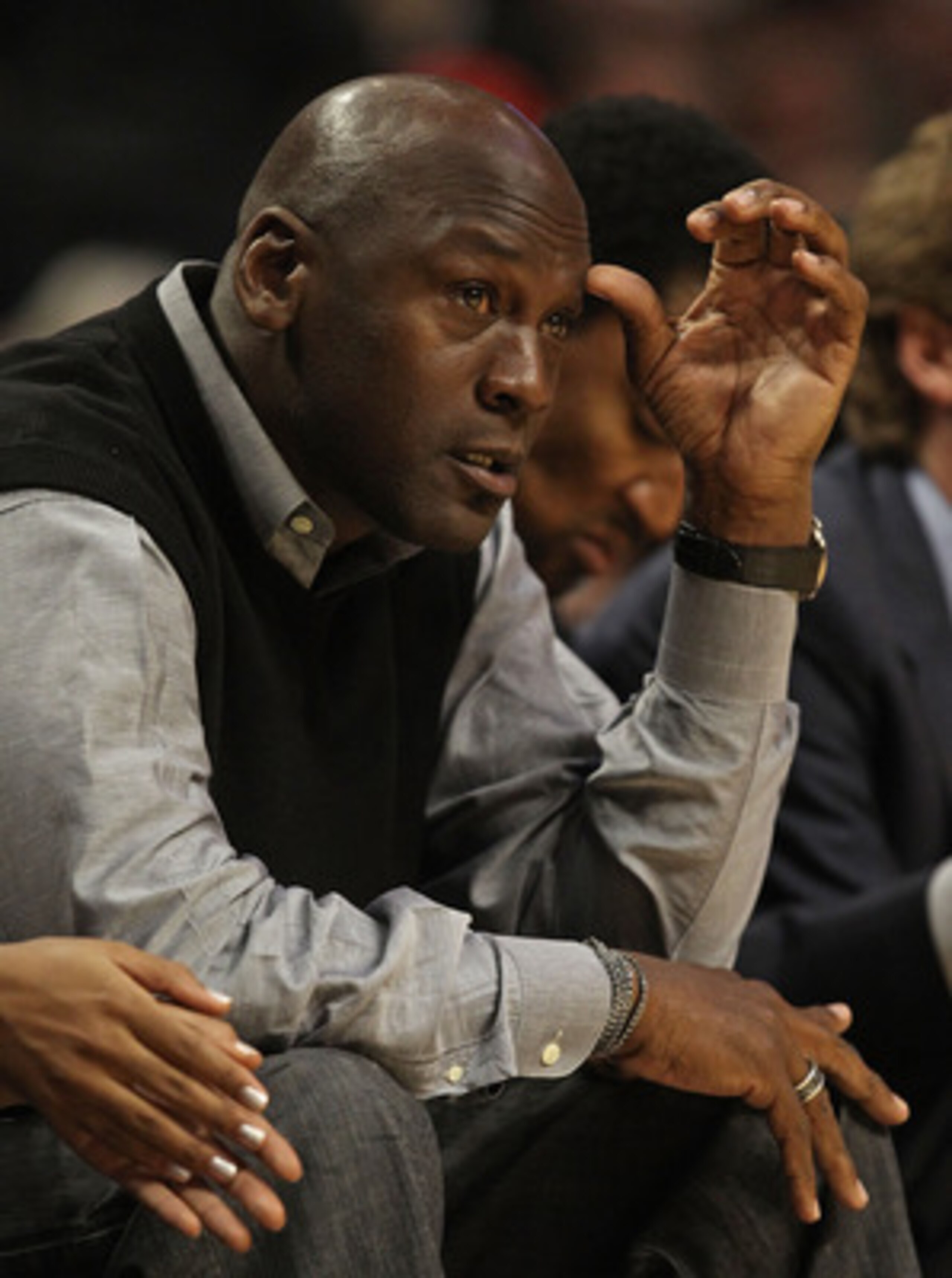 CHICAGO, IL - FEBRUARY 15: Former player Michael Jordan of the Chicago Bulls watches a game between the Bulls and the Charlotte Bobcats at the United Center on February 15, 2011 in Chicago, Illinois. The Bulls defeated the Bobcats 106-94. NOTE TO USER: Us CHICAGO, IL - FEBRUARY 15: Former player Michael Jordan of the Chicago Bulls watches a game between the Bulls and the Charlotte Bobcats at the United Center on February 15, 2011 in Chicago, Illinois. The Bulls defeated the Bobcats 106-94. NOTE TO USER: Us