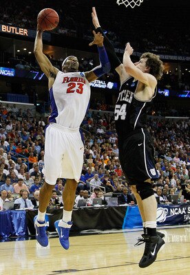 NEW ORLEANS, LA - MARCH 26: Alex Tyus #23 of the Florida Gators shoots over Matt Howard #54 of the Butler Bulldogs during the Southeast regional final of the 2011 NCAA men's basketball tournament at New Orleans Arena on March 26, 2011 in New Orleans, Lou NEW ORLEANS, LA - MARCH 26: Alex Tyus #23 of the Florida Gators shoots over Matt Howard #54 of the Butler Bulldogs during the Southeast regional final of the 2011 NCAA men's basketball tournament at New Orleans Arena on March 26, 2011 in New Orleans, Lou