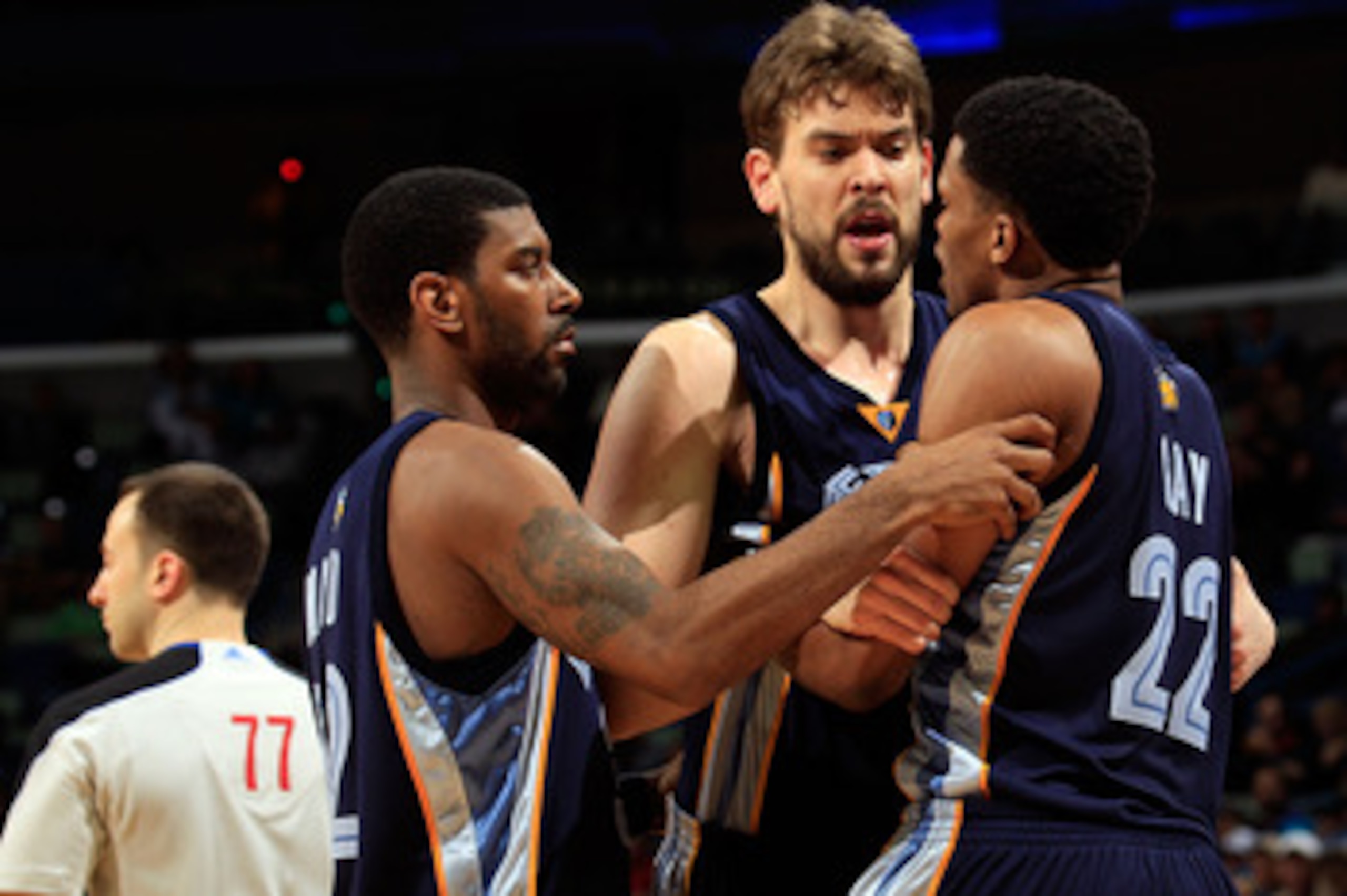 NEW ORLEANS - MARCH 03:  O.J. Mayo #32 and Marc Gasol #33 hold back Rudy Gay #22 of the Memphis Grizzlies after drawing a technical foul for arguing with a referee during the game against the New Orleans Hornets at the New Orleans Arena on March 3, 2010 i