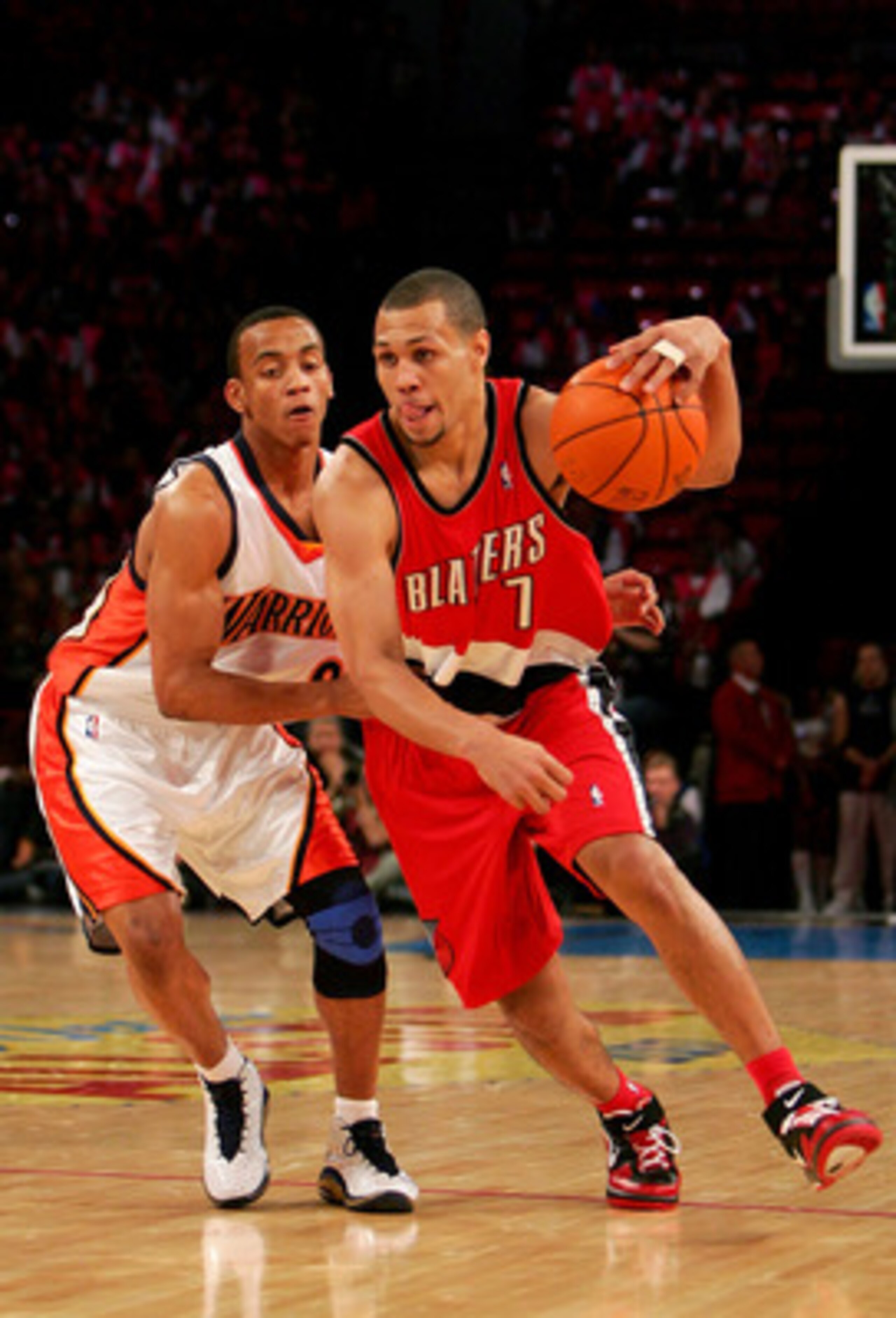 LAS VEGAS - FEBRUARY 16:  Brandon Roy #7 of the Rookie Team handles the ball under pressure from Monta Ellis #8 of the Sophomore Team during the T-Mobile Rookie Challenge at NBA All-Star Weekend on February 16, 2007 at Thomas & Mack Center in Las Vegas, N