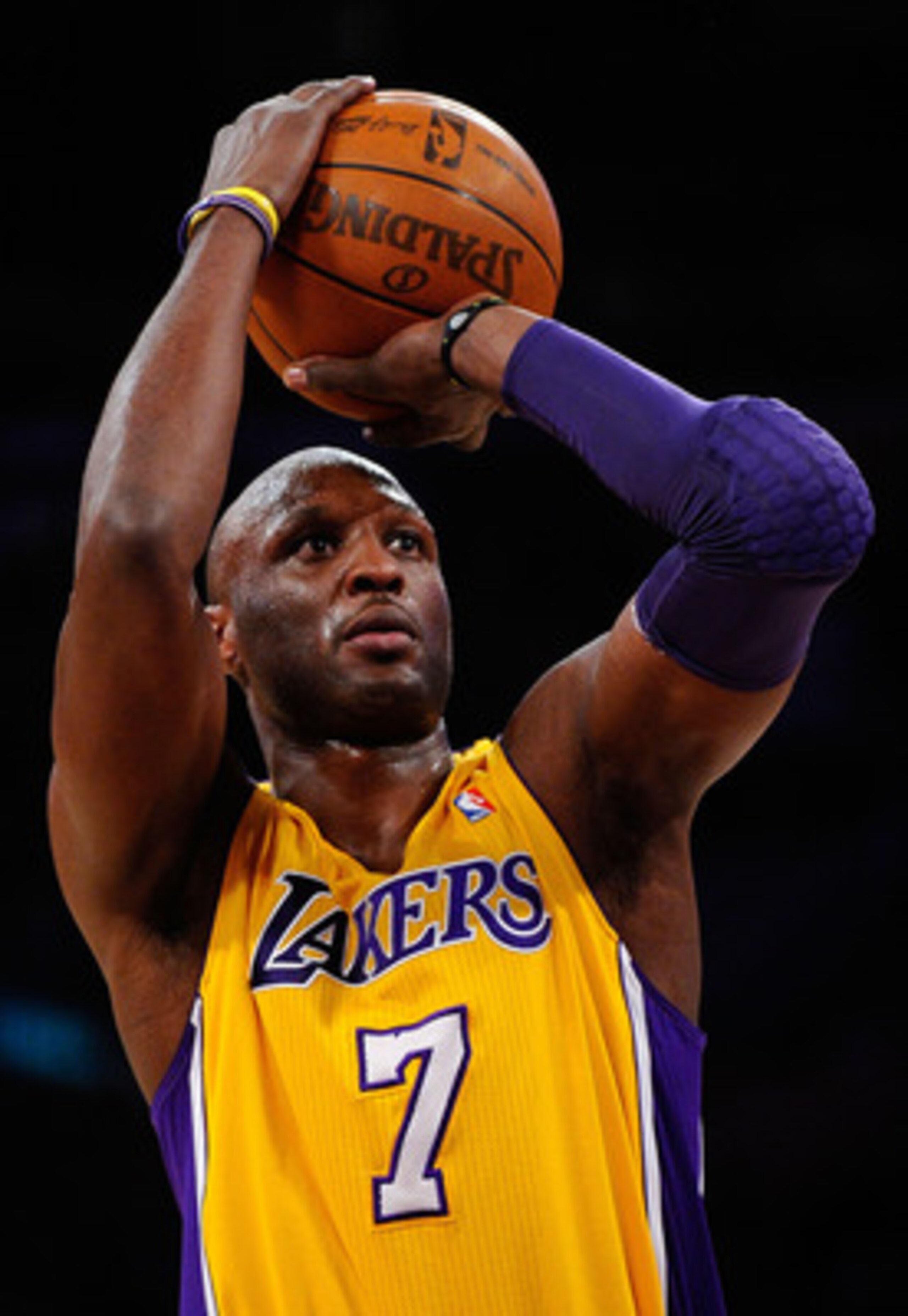 LOS ANGELES, CA - APRIL 20:  Lamar Odom #7 of the Los Angeles Lakers shoots a free throw while taking on the New Orleans Hornets in Game Two of the Western Conference Quarterfinals in the 2011 NBA Playoffs on April 20, 2011 at Staples Center in Los Angele
