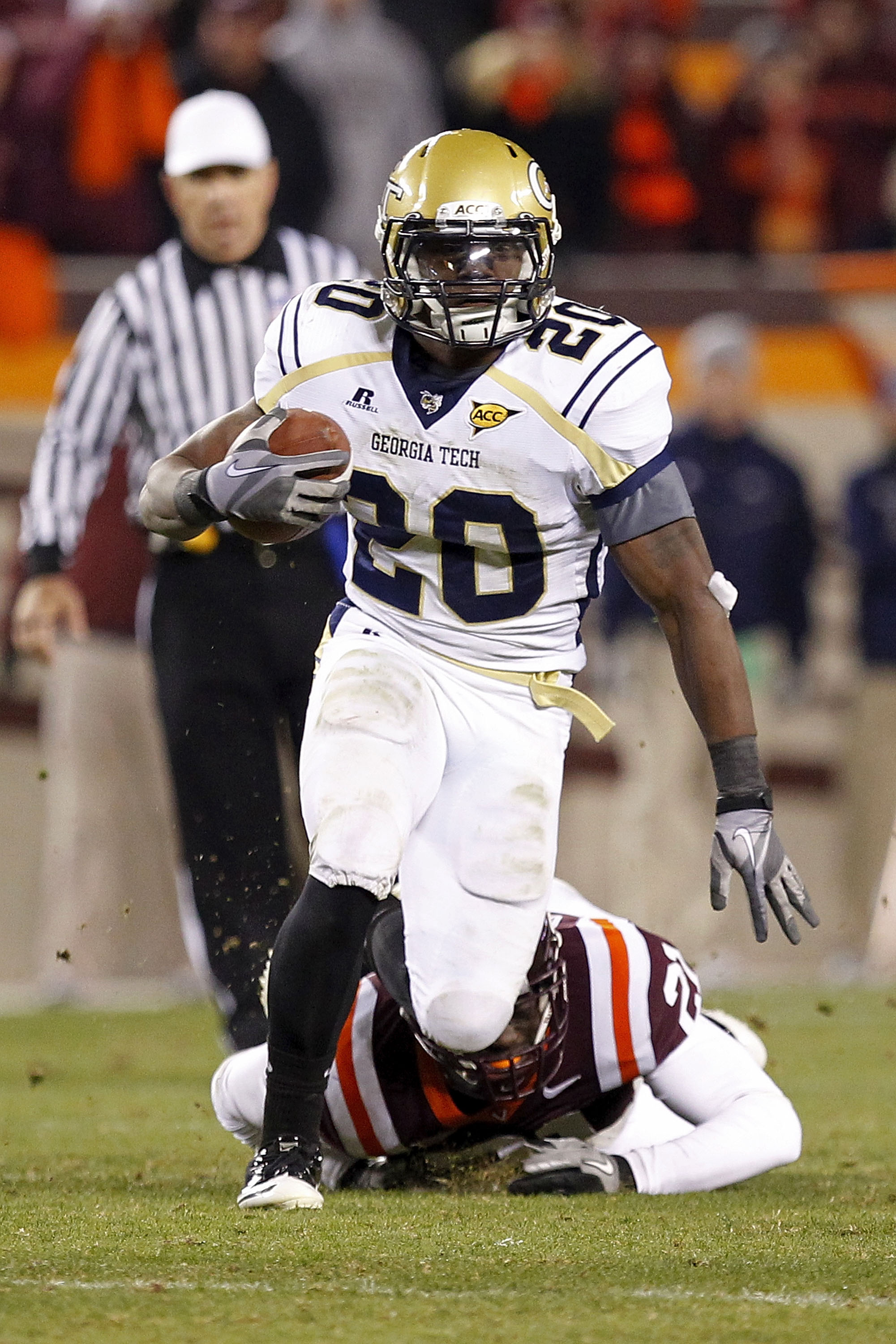 BLACKSBURG, VA - NOVEMBER 04:  Running back Roddy Jones #20 of the Georgia Tech Yellow Jackets runs with the ball against the Virginia Tech Hokies at Lane Stadium on November 4, 2010 in Blacksburg, Virginia.  (Photo by Geoff Burke/Getty Images)