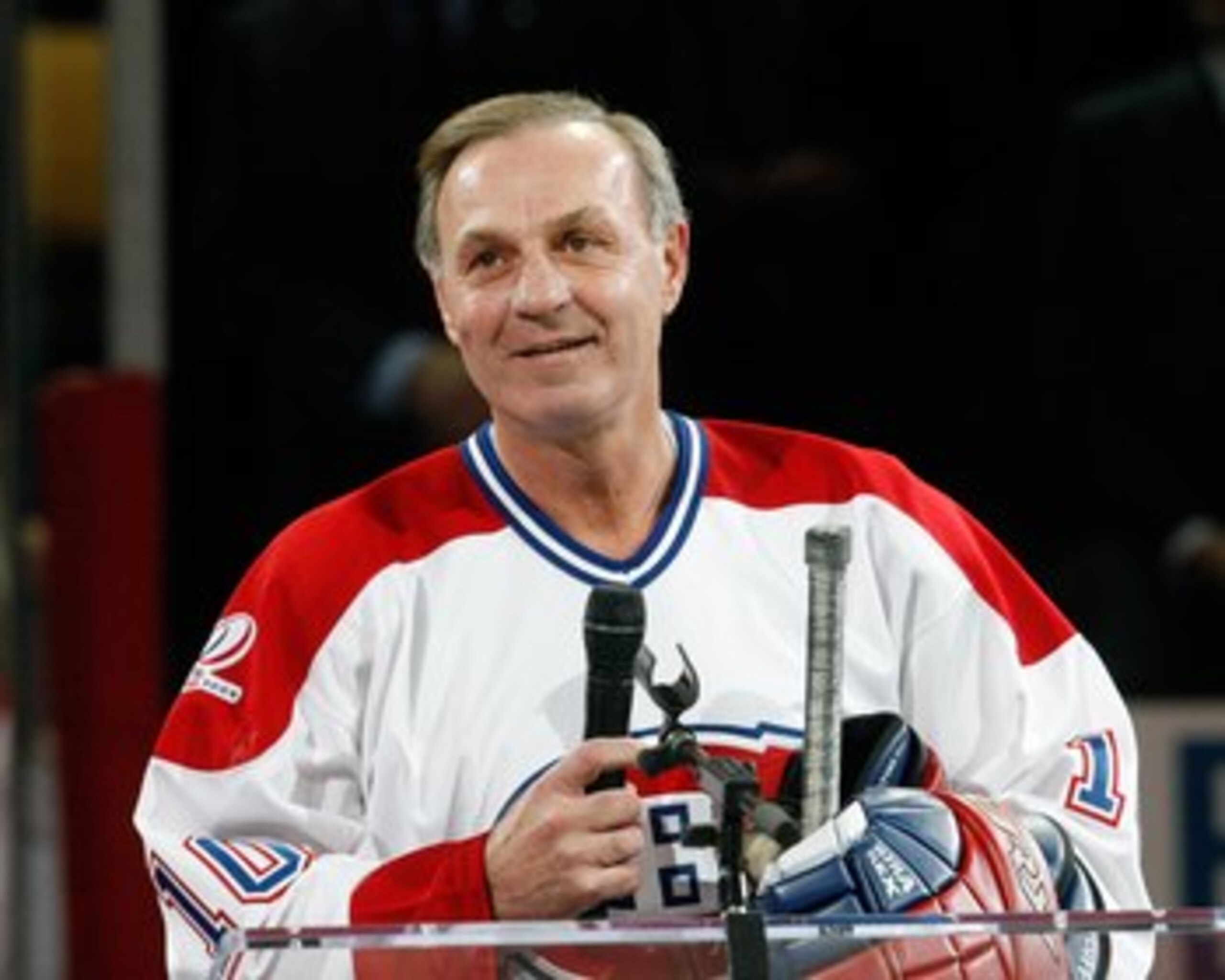 MONTREAL- DECEMBER 4: Former Montreal Canadien Guy Lafleur speaks to fans during the Centennial Celebration ceremonies prior to the NHL game between the Montreal Canadiens and Boston Bruins on December 4, 2009 at the Bell Centre in Montreal, Quebec, Cana MONTREAL- DECEMBER 4: Former Montreal Canadien Guy Lafleur speaks to fans during the Centennial Celebration ceremonies prior to the NHL game between the Montreal Canadiens and Boston Bruins on December 4, 2009 at the Bell Centre in Montreal, Quebec, Cana