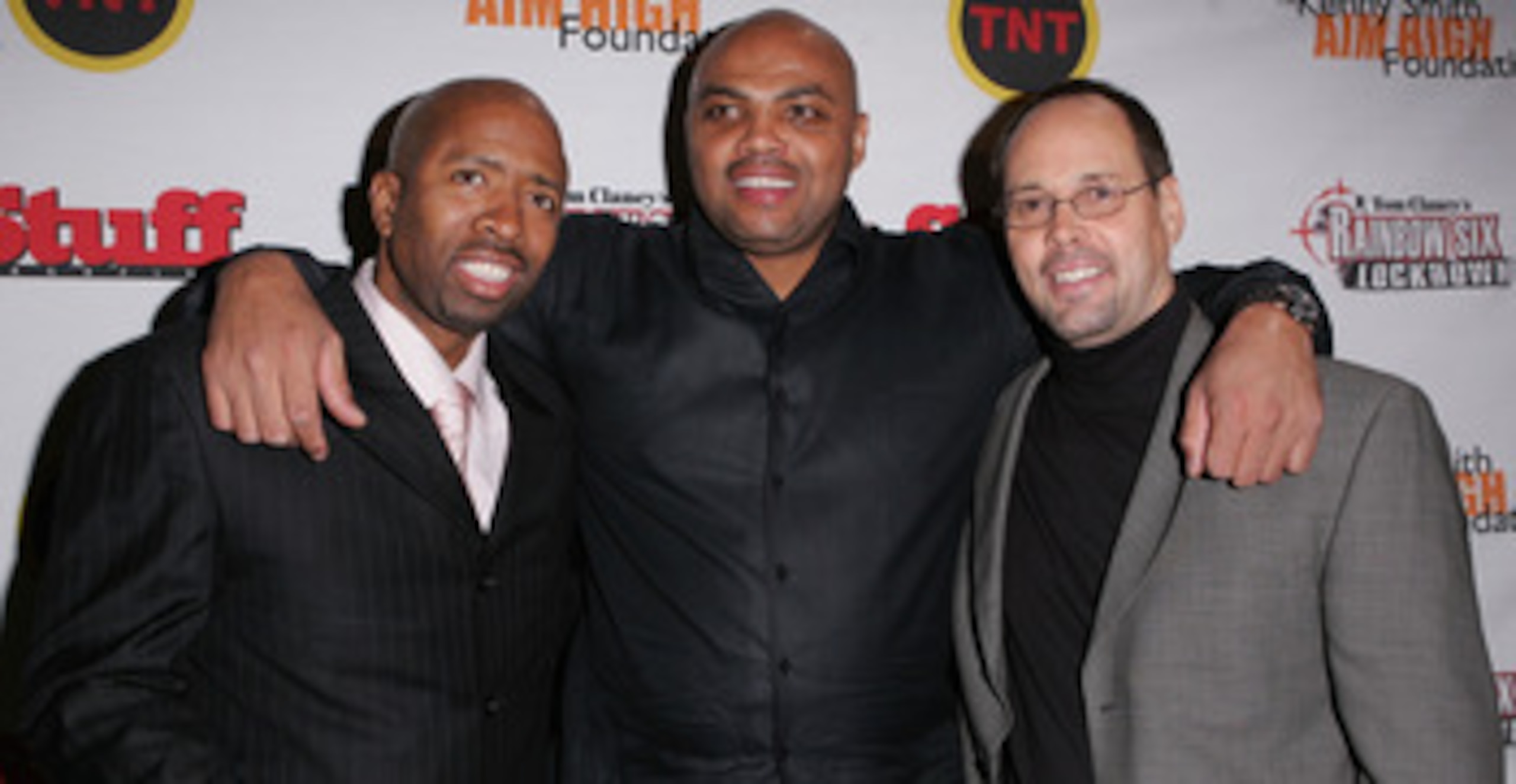 DENVER - FEBRUARY 18:  Kenny Smith, Charles Barkley and guest arrive at Kenny Smith's 2005 All-Star Party on February 18, 2005 in Denver, Colorado.  (Photo By Mark Mainz/Getty Images)