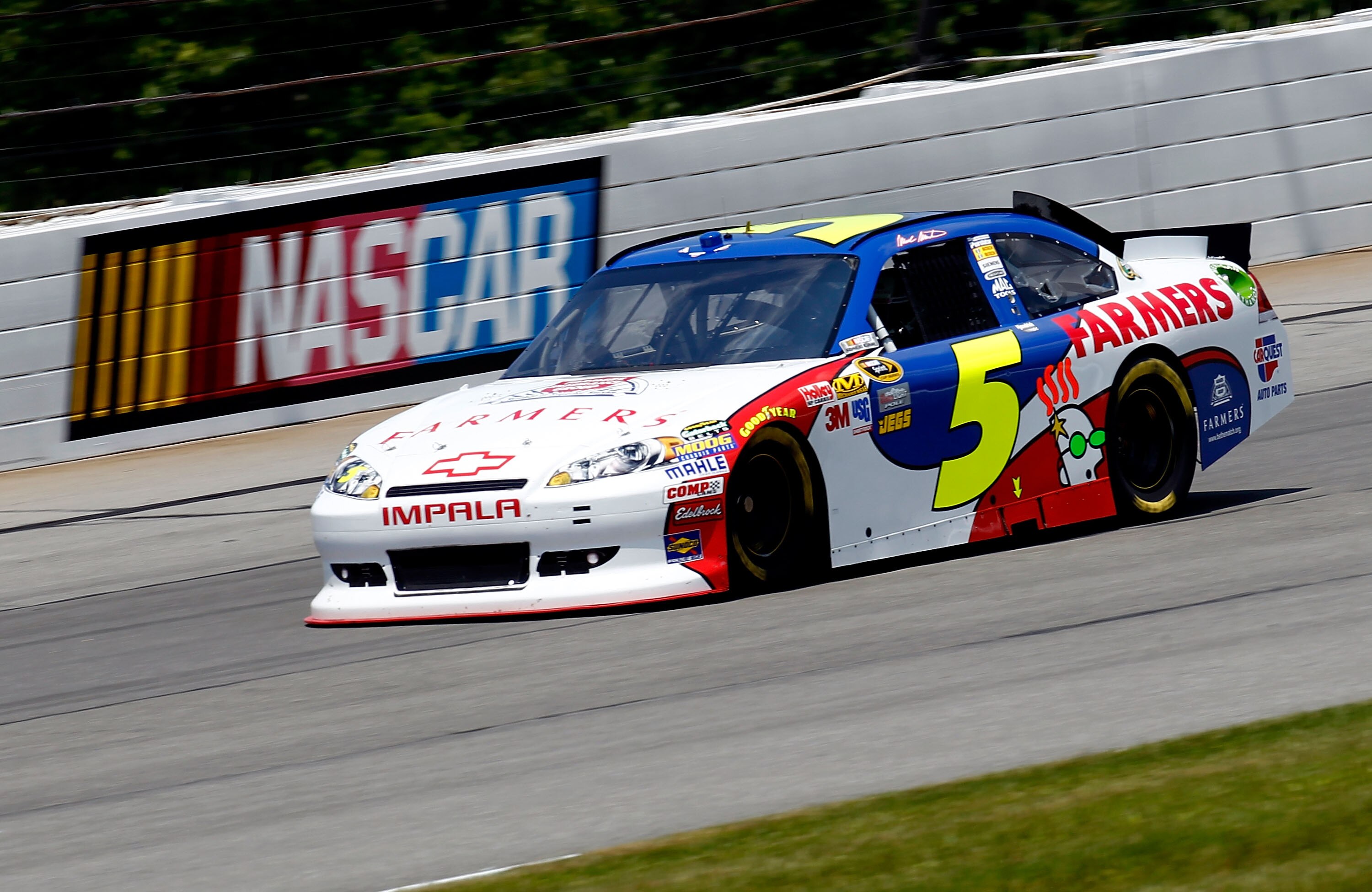 LONG POND, PA - JUNE 10:  Mark Martin, driver of the #5 Farmers Insurance/GoDaddy.com Chevrolet, practices for the NASCAR Sprint Cup Series 5-Hour Energy 500 at Pocono Raceway on June 10, 2011 in Long Pond, Pennsylvania.  (Photo by Jeff Zelevansky/Getty I
