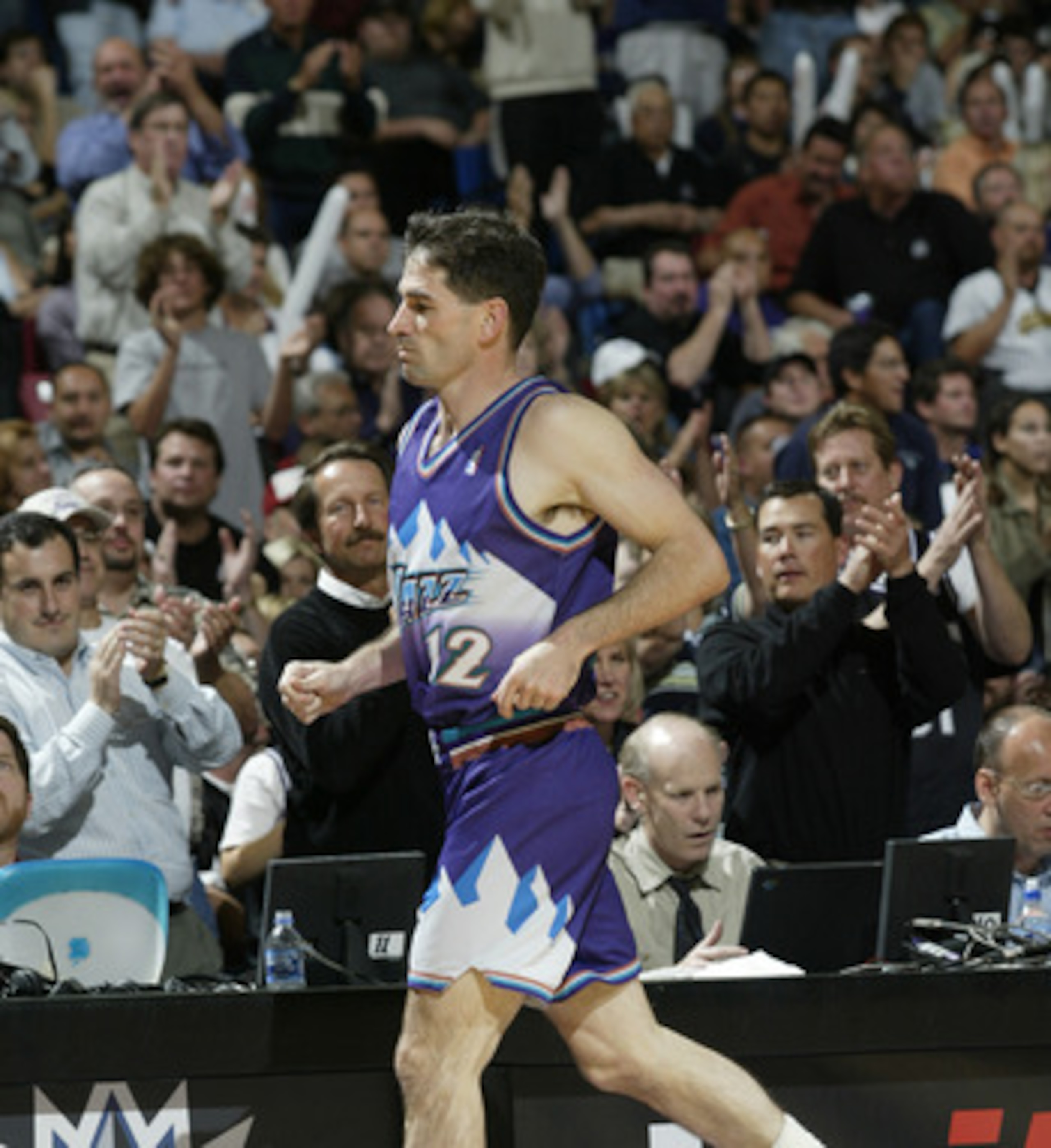 SACRAMENTO, CA - APRIL 30:  John Stockton #12 of the Utah Jazz exits the court in Game five of the Western Conference Quarterfinals against the Sacramento Kings during the 2003 NBA Playoffs at Arco Arena on April 30, 2003 in Sacramento, California.  The K
