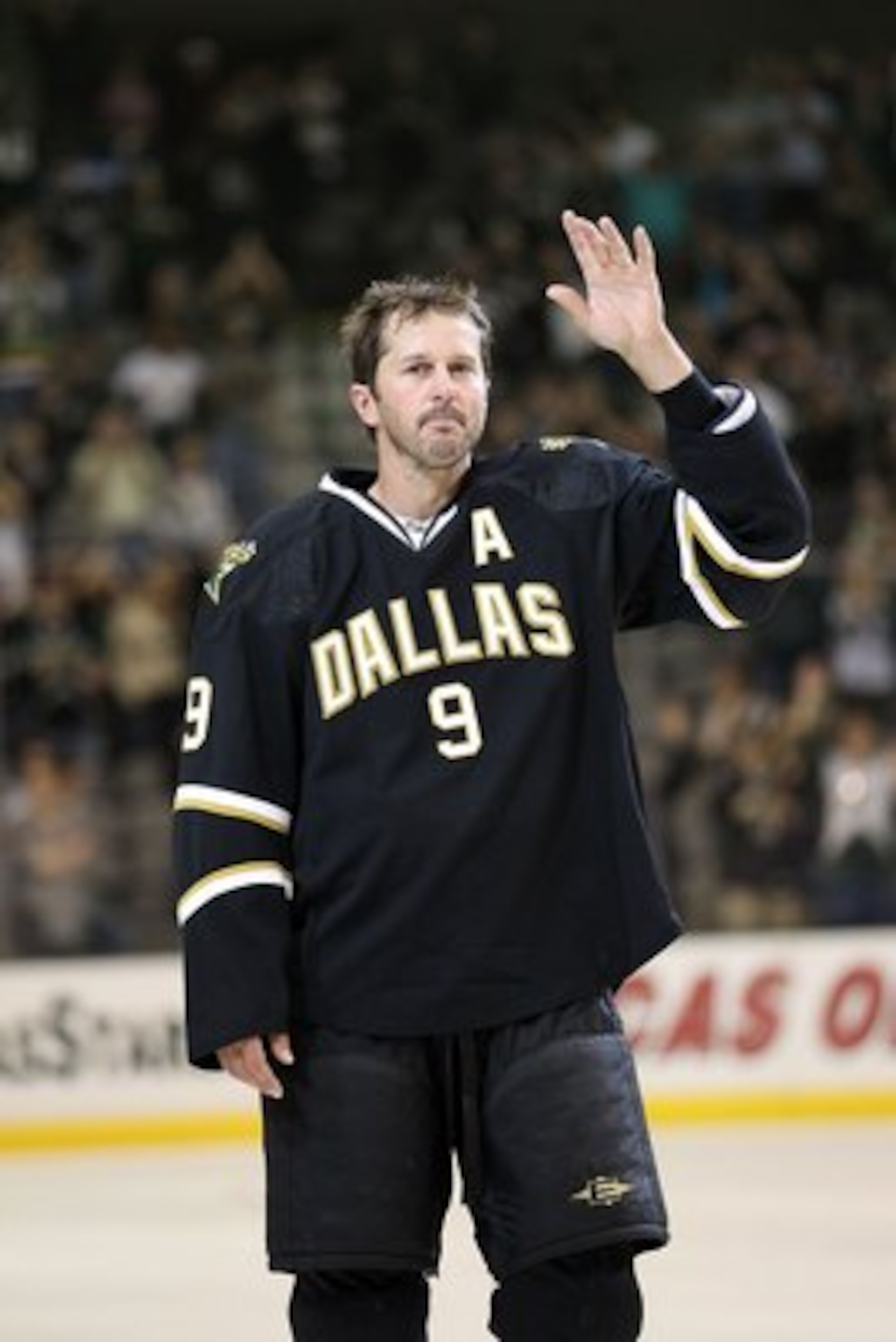 DALLAS - APRIL 08: Center Mike Modano #9 of the Dallas Stars waves to the crowd after his last home game of the season against the Anaheim Ducks at American Airlines Center on April 8, 2010 in Dallas, Texas. (Photo by Ronald Martinez/Getty Images) DALLAS - APRIL 08: Center Mike Modano #9 of the Dallas Stars waves to the crowd after his last home game of the season against the Anaheim Ducks at American Airlines Center on April 8, 2010 in Dallas, Texas. (Photo by Ronald Martinez/Getty Images)