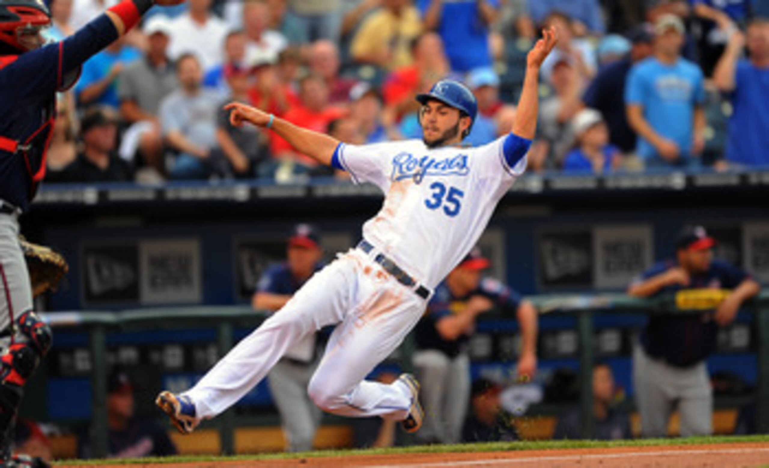 KANSAS CITY, MO - JUNE 2:  Eric Hosmer #35 of the Kansas City Royals slides in to score a run in the first inning against the Minnesota Twins at Kauffman Stadium on June 2, 2011 in Kansas City, Missouri. (Photo by G. Newman Lowrance/Getty Images)