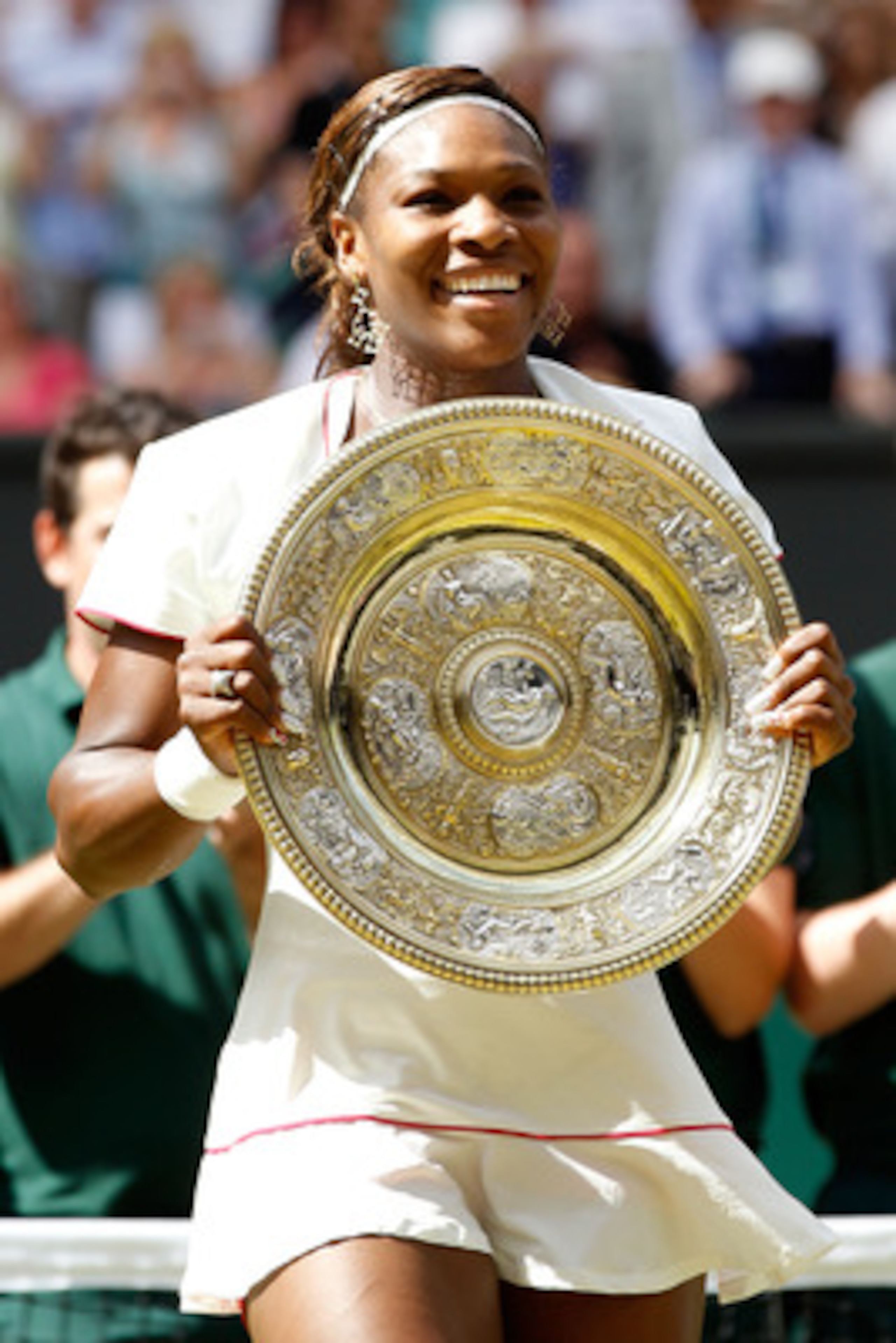 LONDON, ENGLAND - JULY 03:  Serena Williams of USA lifts the Championship trophy after winning her Ladies Singles Final Match against Vera Zvonareva of Russia on Day Twelve of the Wimbledon Lawn Tennis Championships at the All England Lawn Tennis and Croq