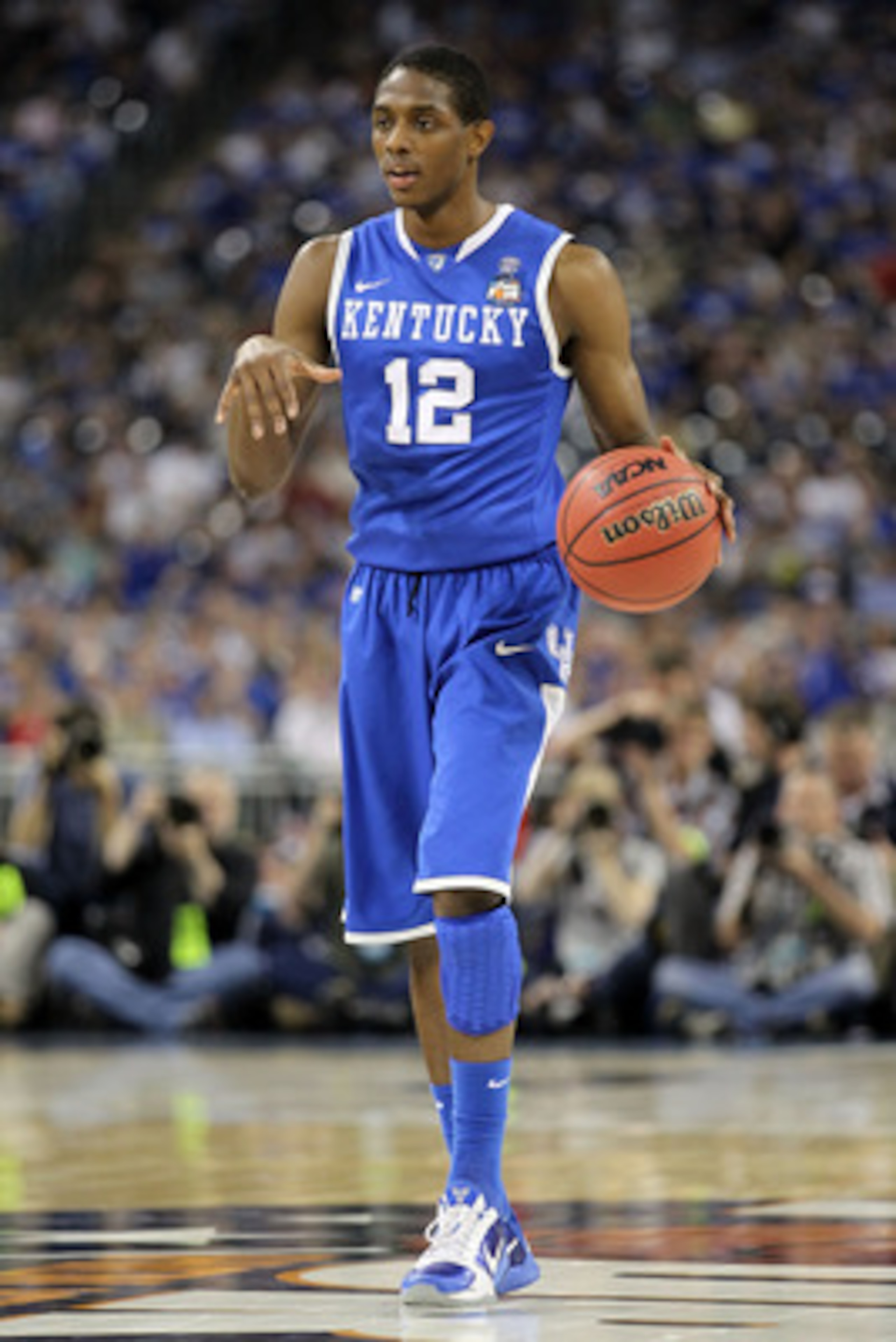 HOUSTON, TX - APRIL 02:  Brandon Knight #12 of the Kentucky Wildcats moves the ball while taking on the Connecticut Huskies during the National Semifinal game of the 2011 NCAA Division I Men's Basketball Championship at Reliant Stadium on April 2, 2011 in