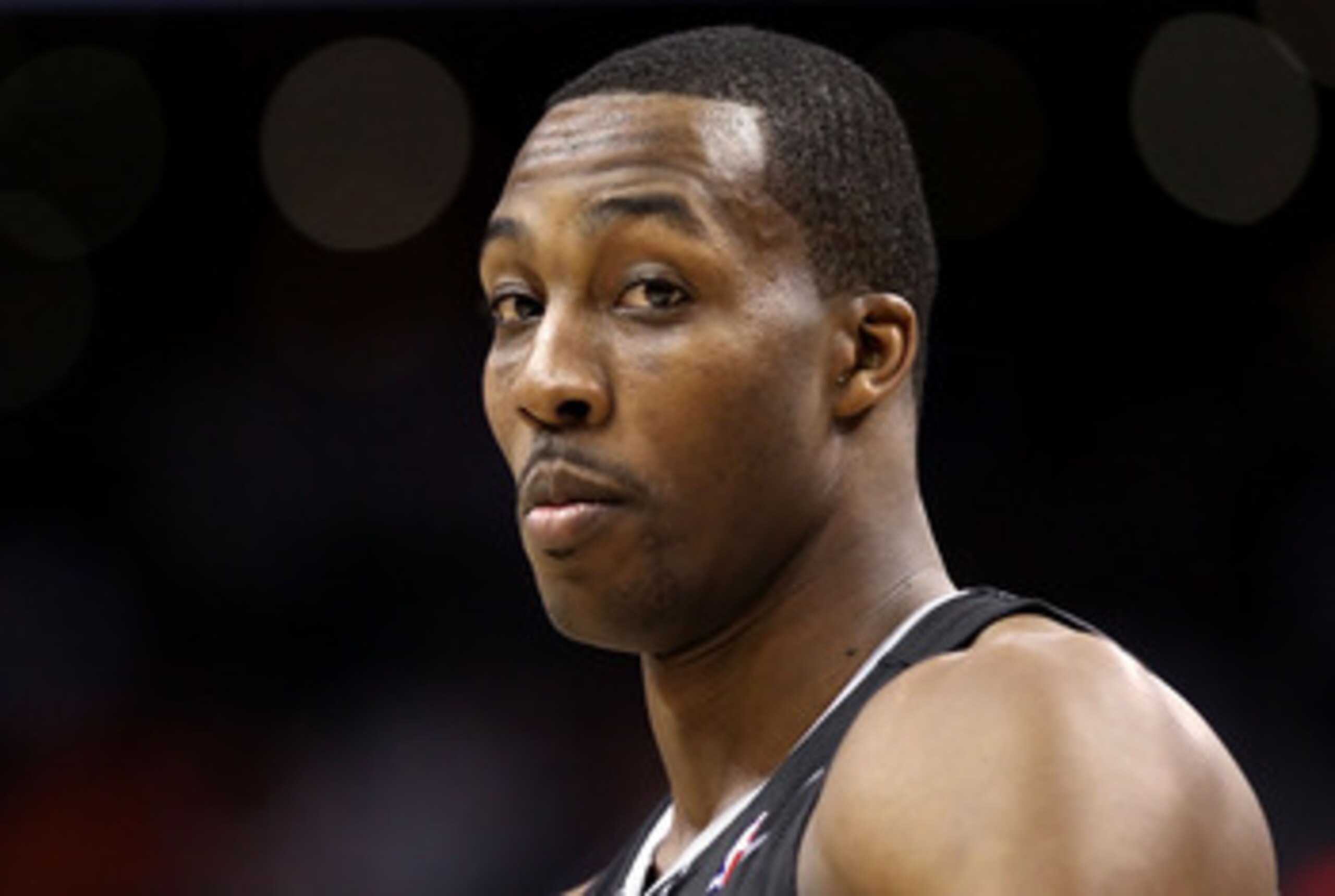 PHOENIX, AZ - MARCH 13:  Dwight Howard #12 of the Orlando Magic during the NBA game against the Phoenix Suns at US Airways Center on March 13, 2011 in Phoenix, Arizona. The Magic defeated the Suns 111-88. NOTE TO USER: User expressly acknowledges and agre
