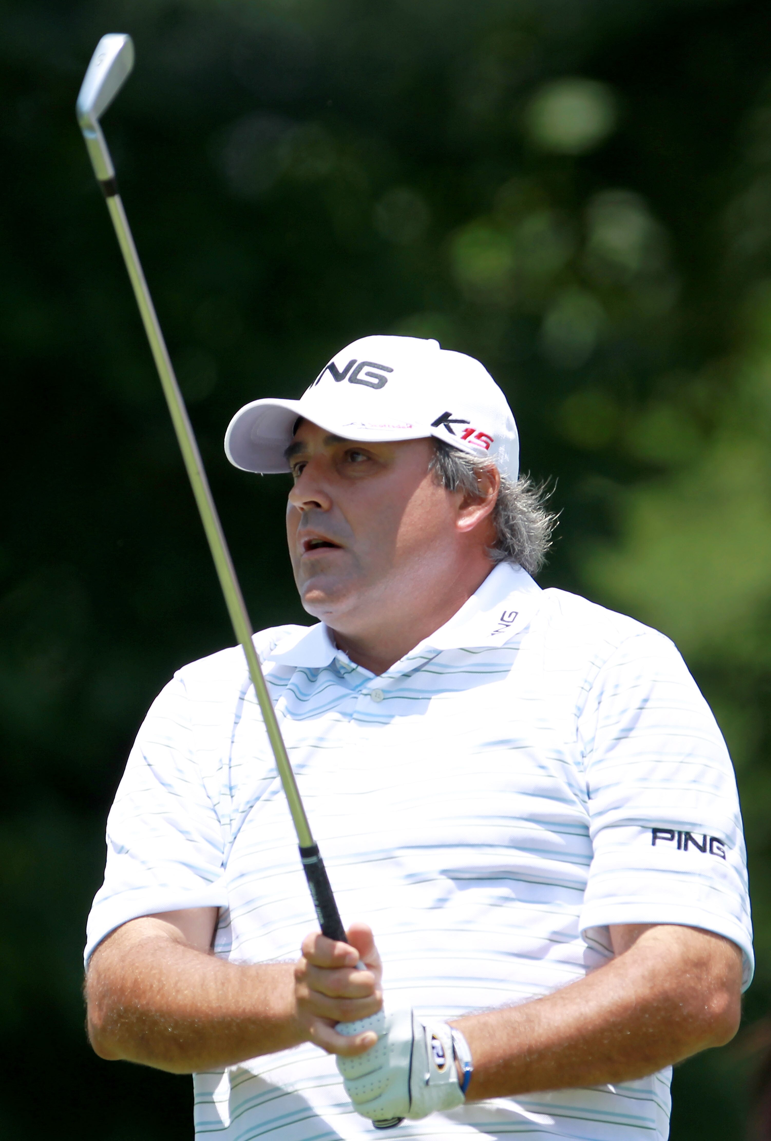 BETHESDA, MD - JUNE 13:  Angel Cabrera of Argentina hits a shot during a practice round prior to the start of the 111th U.S. Open at Congressional Country Club on June 13, 2011 in Bethesda, Maryland.  (Photo by Scott Halleran/Getty Images)