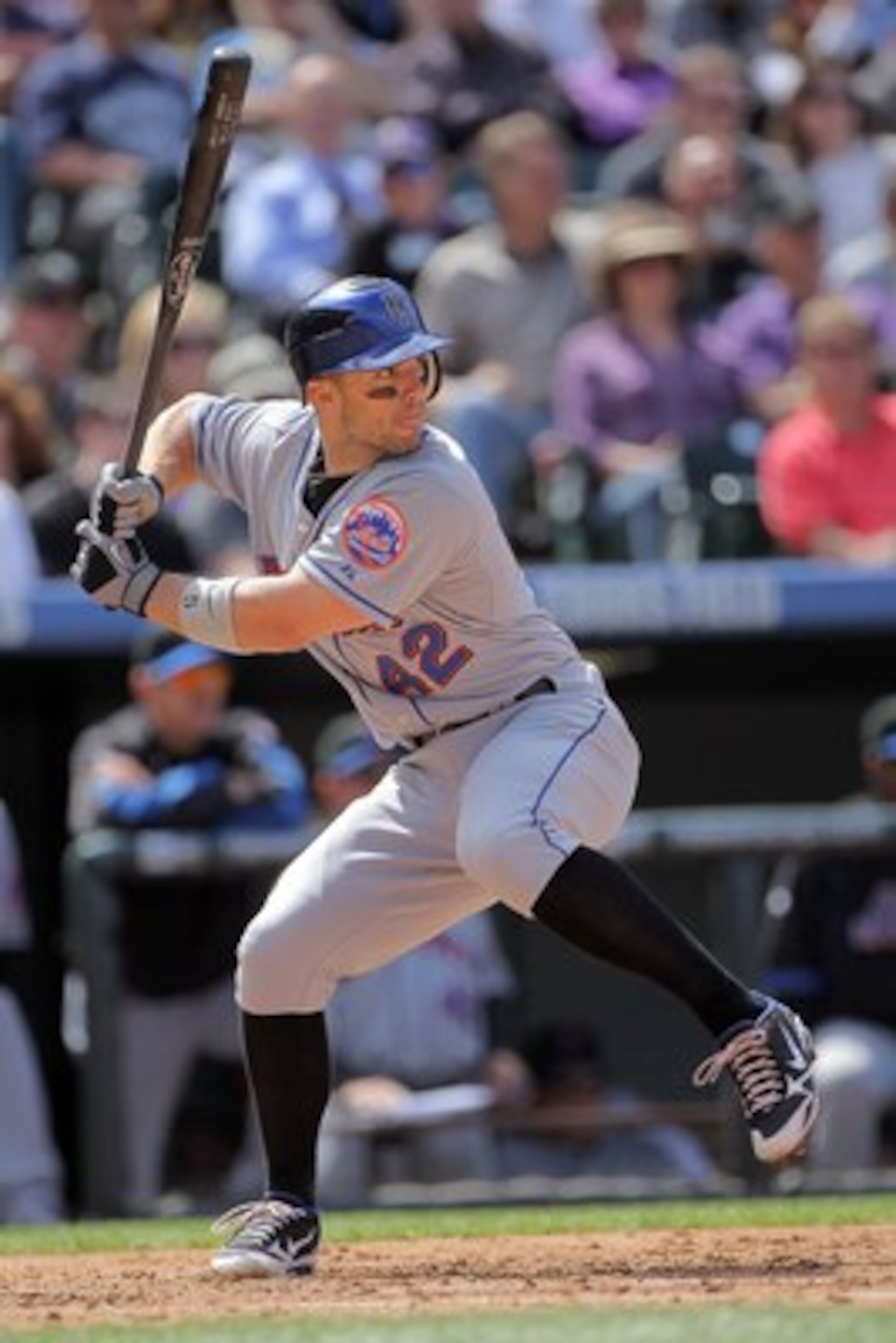 DENVER - APRIL 15:  Third baseman David Wright #42 of the New York Mets takes an at bat against the Colorado Rockies at Coors Field on April 15, 2010 in Denver, Colorado. All the players in MLB wore #42 today in honor of Jackie Robinson Day. The Mets defe