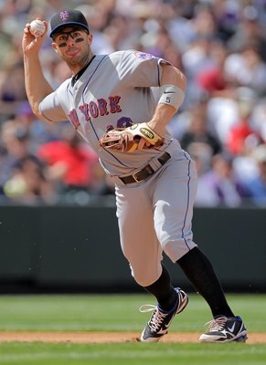 DENVER - APRIL 15:  Third baseman David Wright #42 of the New York Mets throws out a runner against the Colorado Rockies at Coors Field on April 15, 2010 in Denver, Colorado. All the players in MLB wore #42 today in honor of Jackie Robinson Day. The Mets 