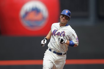 NEW YORK - APRIL 05:  David Wright #5 of the New York Mets rounds the bases after his two run home run in the first inning against the Florida Marlins during their Opening Day Game at Citi Field on April 5, 2010 in the Flushing neighborhood of the Queens 
