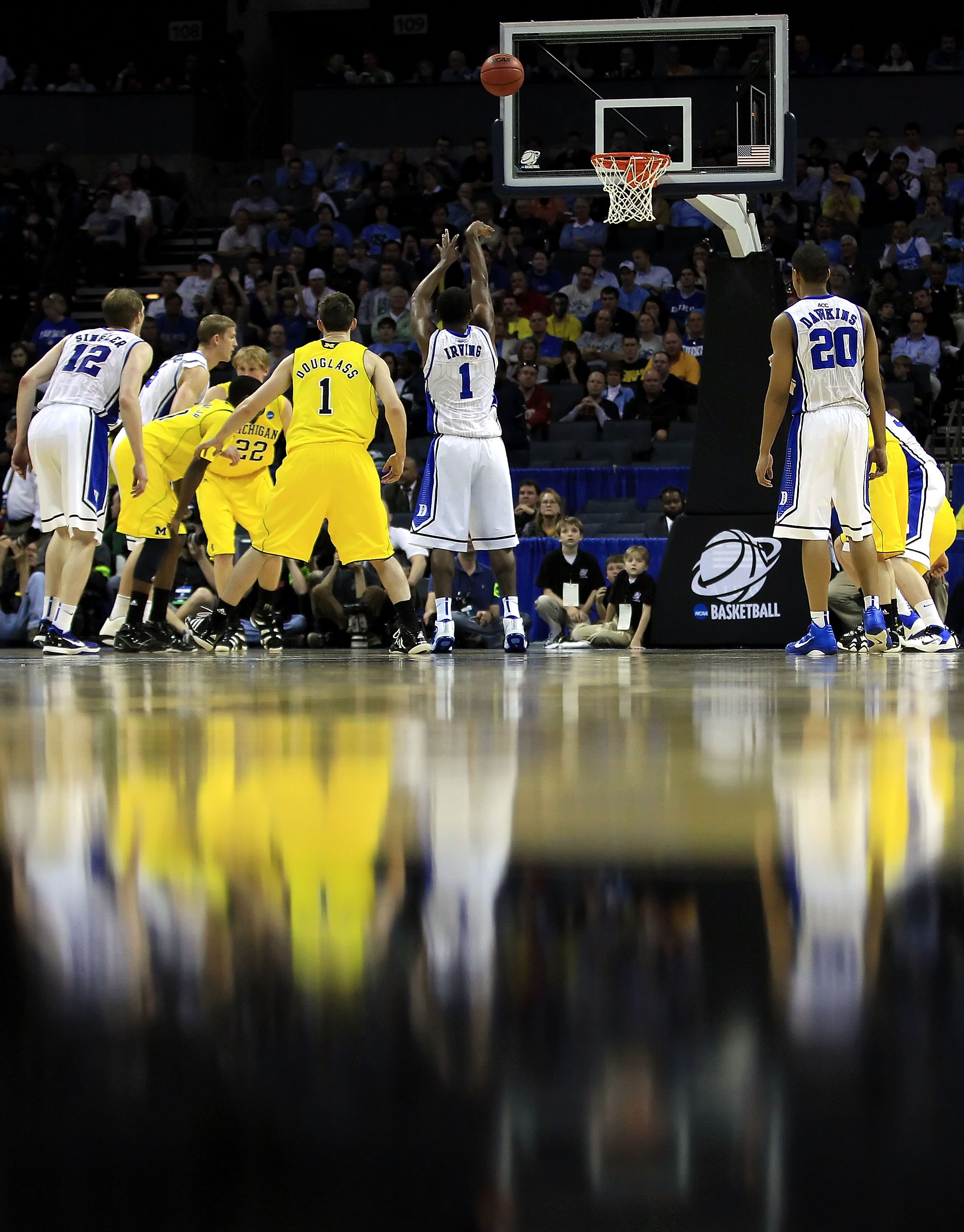 CHARLOTTE, NC - MARCH 20: Kyrie Irving #1 of the Duke Blue Devils shoots a free throw while taking on the Michigan Wolverines during the third round of the 2011 NCAA men's basketball tournament at Time Warner Cable Arena on March 20, 2011 in Charlotte, N CHARLOTTE, NC - MARCH 20: Kyrie Irving #1 of the Duke Blue Devils shoots a free throw while taking on the Michigan Wolverines during the third round of the 2011 NCAA men's basketball tournament at Time Warner Cable Arena on March 20, 2011 in Charlotte, N