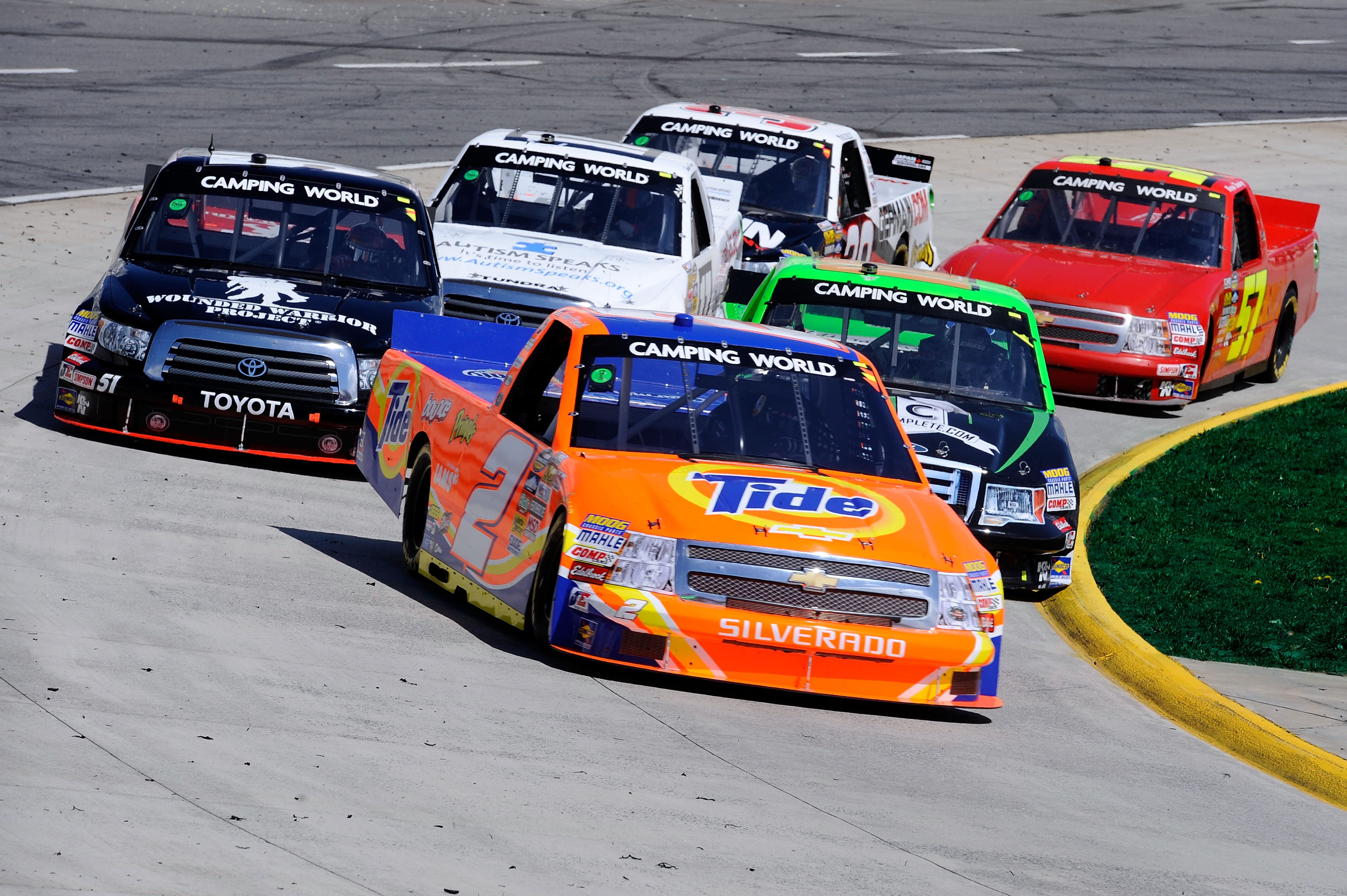 MARTINSVILLE, VA - APRIL 02:  Kevin Harvick, driver of the #2 Tide/Kroger Chevrolet, leads a group of trucks during the NASCAR Camping World Truck Series Kroger 250 at Martinsville Speedway on April 2, 2011 in Martinsville, Virginia.  (Photo by John Harre