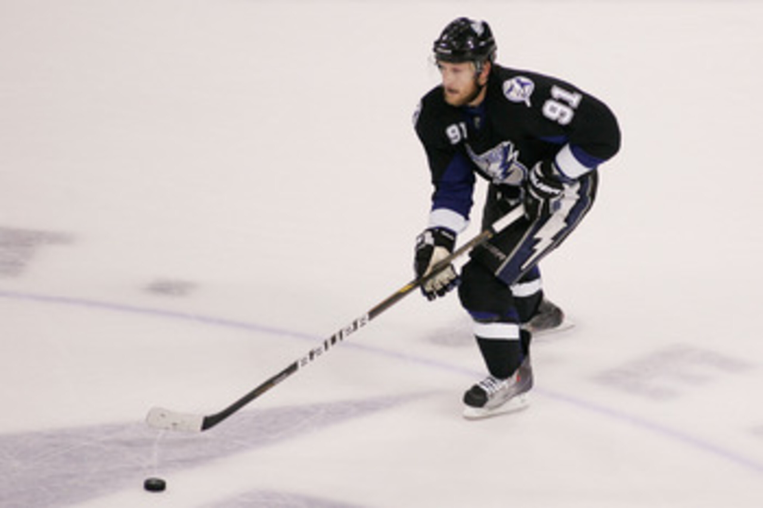 TAMPA, FL - MAY 25: Steven Stamkos #91 of the Tampa Bay Lightning controls the puck in Game Six of the Eastern Conference Finals against the Boston Bruins during the 2011 NHL Stanley Cup Playoffs at St Pete Times Forum on May 25, 2011 in Tampa, Florida. TAMPA, FL - MAY 25: Steven Stamkos #91 of the Tampa Bay Lightning controls the puck in Game Six of the Eastern Conference Finals against the Boston Bruins during the 2011 NHL Stanley Cup Playoffs at St Pete Times Forum on May 25, 2011 in Tampa, Florida.