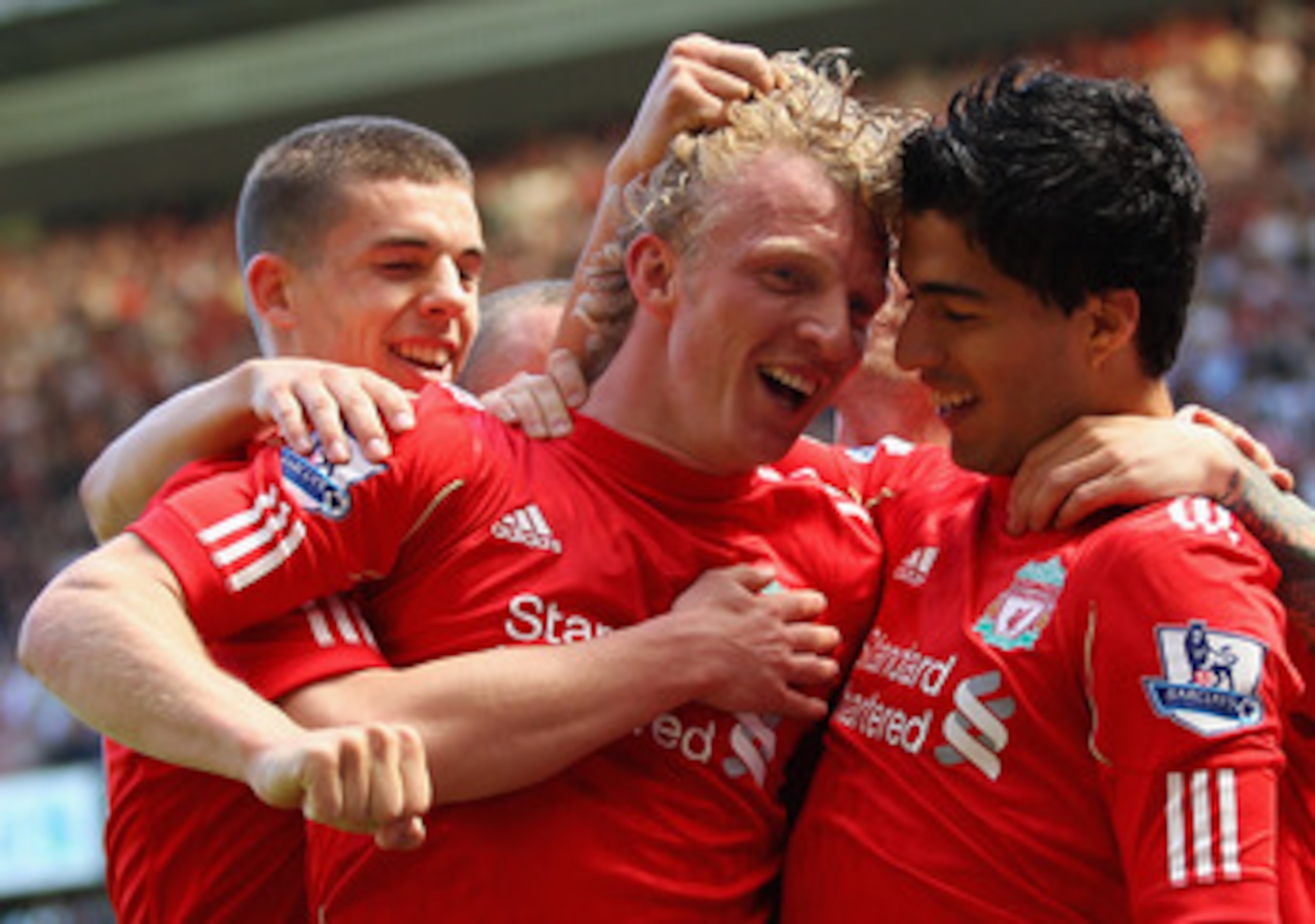 LIVERPOOL, ENGLAND - MAY 01:  Luis Suarez of Liverpool celebrates with team mate Dirk Kuyt after scoring the third goal during the Barclays Premier League match between Liverpool  and Newcastle United at Anfield on May 1, 2011 in Liverpool, England.  (Pho