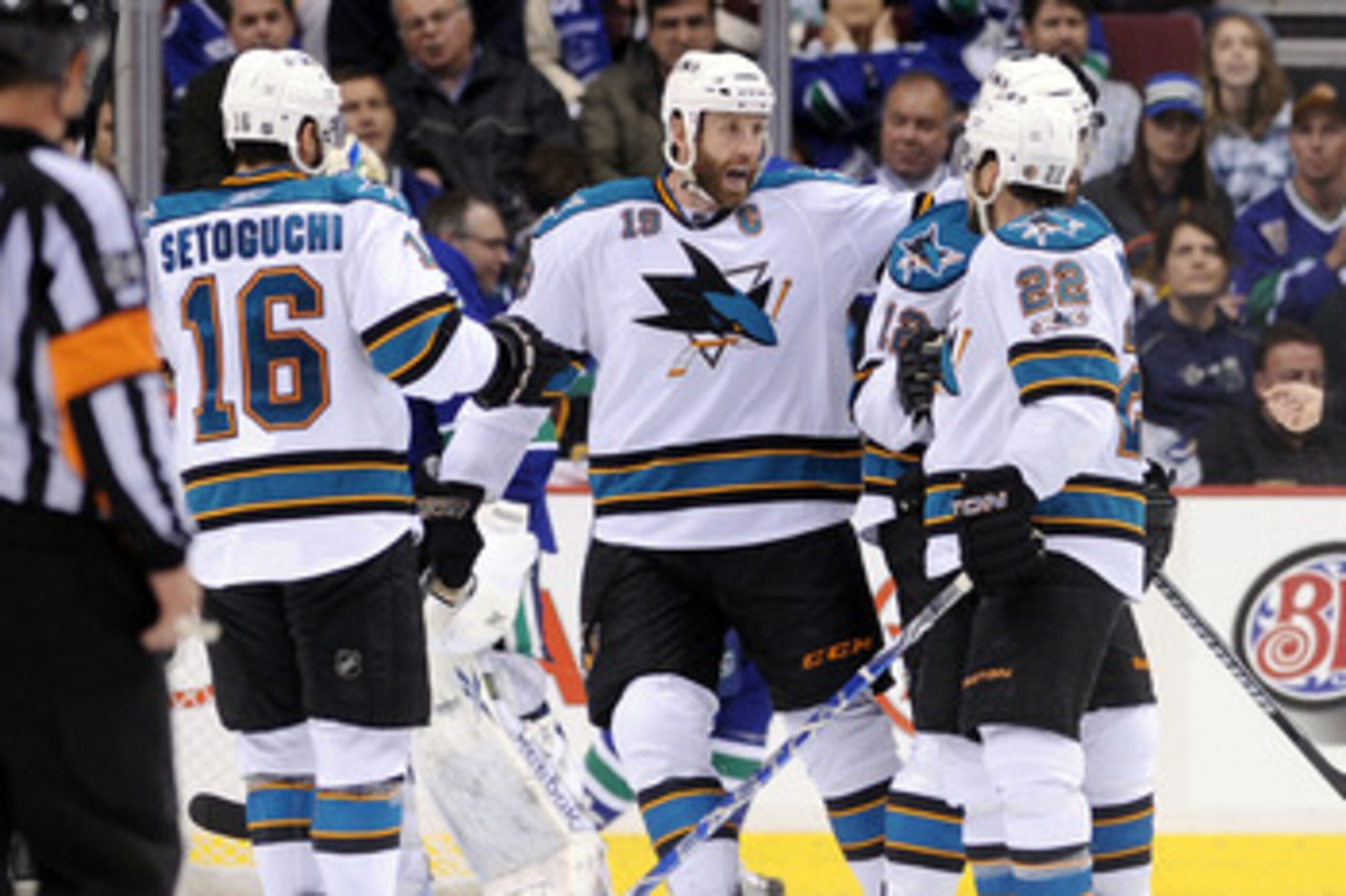 VANCOUVER, CANADA - MAY 15:  Devin Setoguchi #16, Joe Thornton #19 and Dan Boyle #22 of the San Jose Sharks celebrate with teammate Patrick Marleau #12 after Marleau's goal in Game One of the Western Conference Finals against the Vancouver Canucks during 