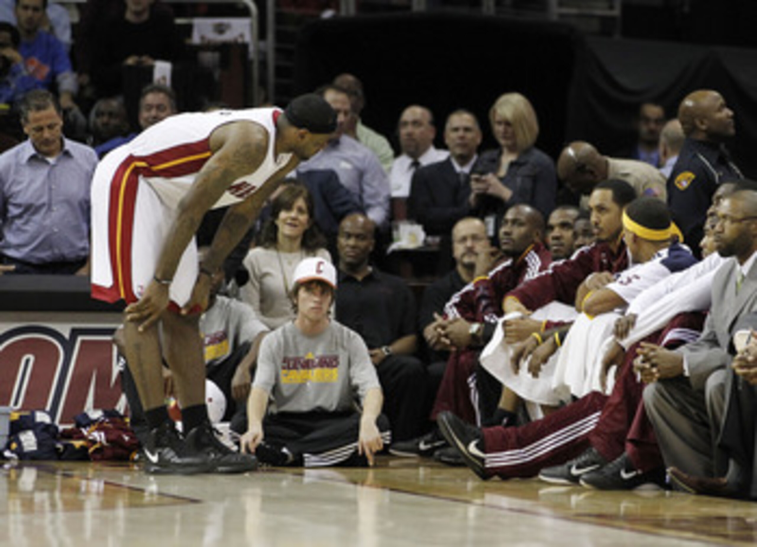 CLEVELAND, OH - DECEMBER 02:  LeBron James #6 of the Miami Heat talks to the Cleveland Cavaliers bench during a game at Quicken Loans Arena on December 2, 2010 in Cleveland, Ohio. NOTE TO USER: User expressly acknowledges and agrees that, by downloading a