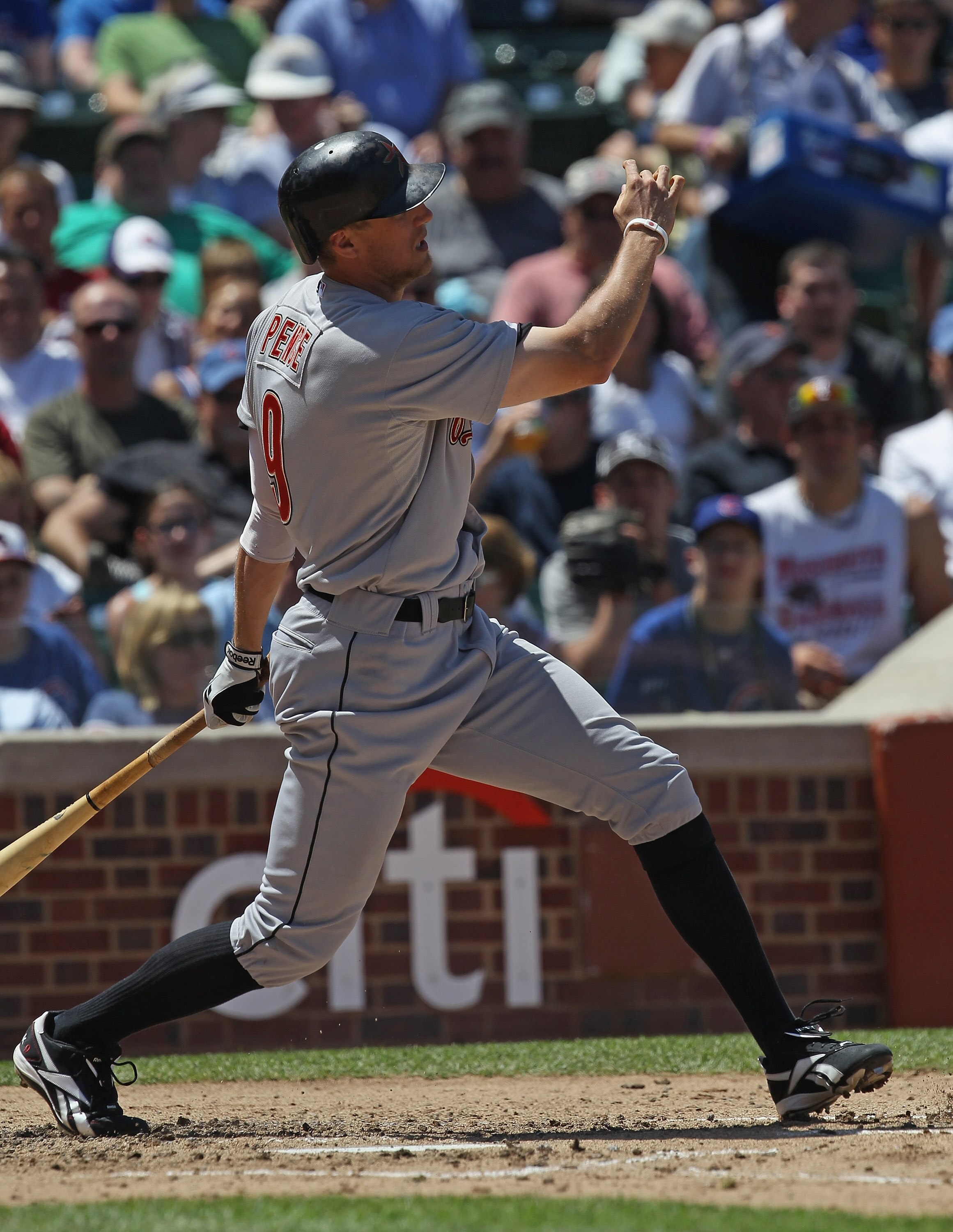 CHICAGO, IL - JUNE 01:  Hunter Pence #9 of the Houston Astros takes a swing against the Chicago Cubs at Wrigley Field on June 1, 2011 in Chicago, Illinois. The Astros defeated the Cubs 3-1.  (Photo by Jonathan Daniel/Getty Images)