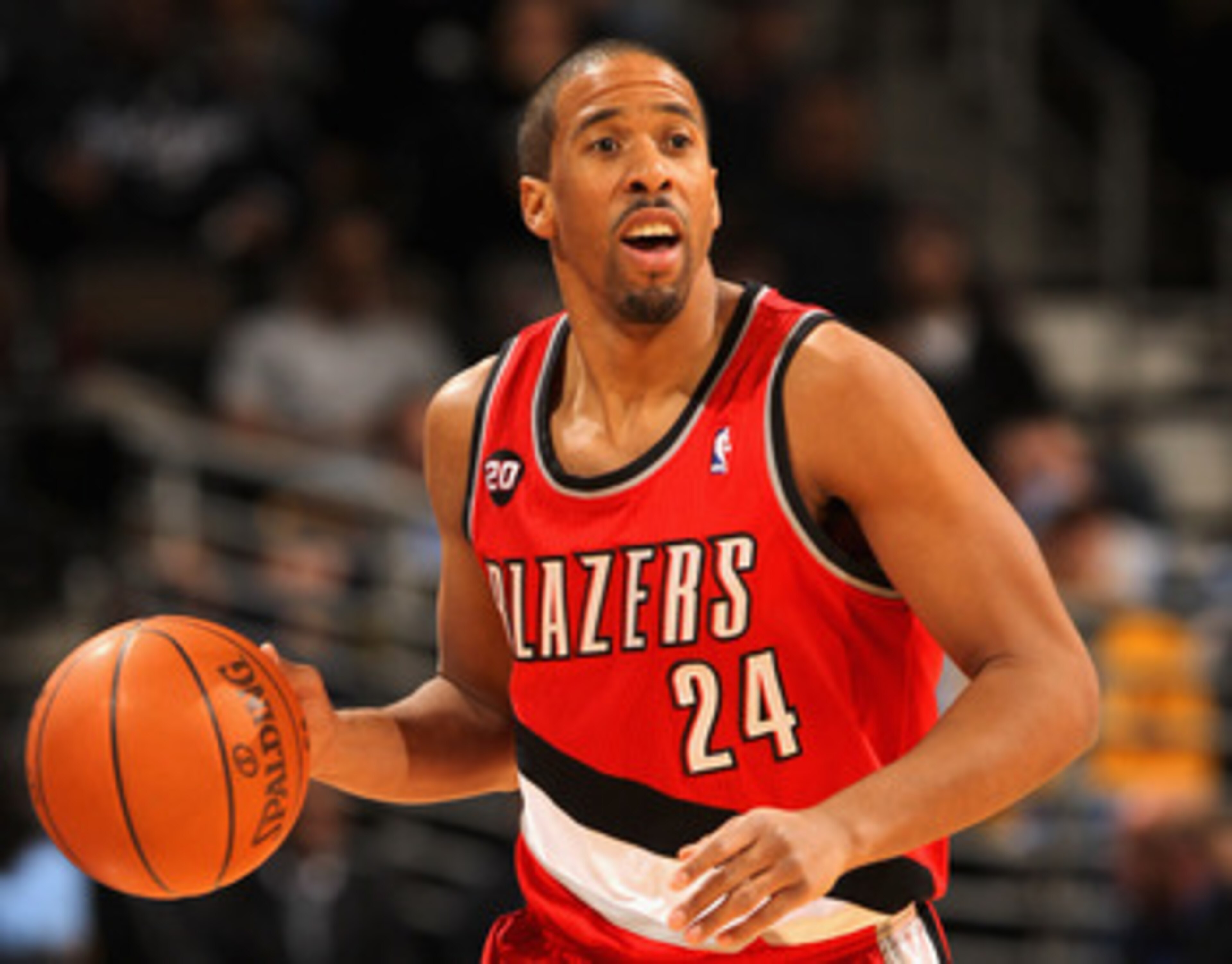 DENVER - DECEMBER 28:  Andre Miller #24 of the Portland Trail Blazers dribbles the ball against the Denver Nuggets at Pepsi Center on December 28, 2010 in Denver, Colorado. The Nuggets defeated the Blazers 95-77. NOTE TO USER: User expressly acknowledges