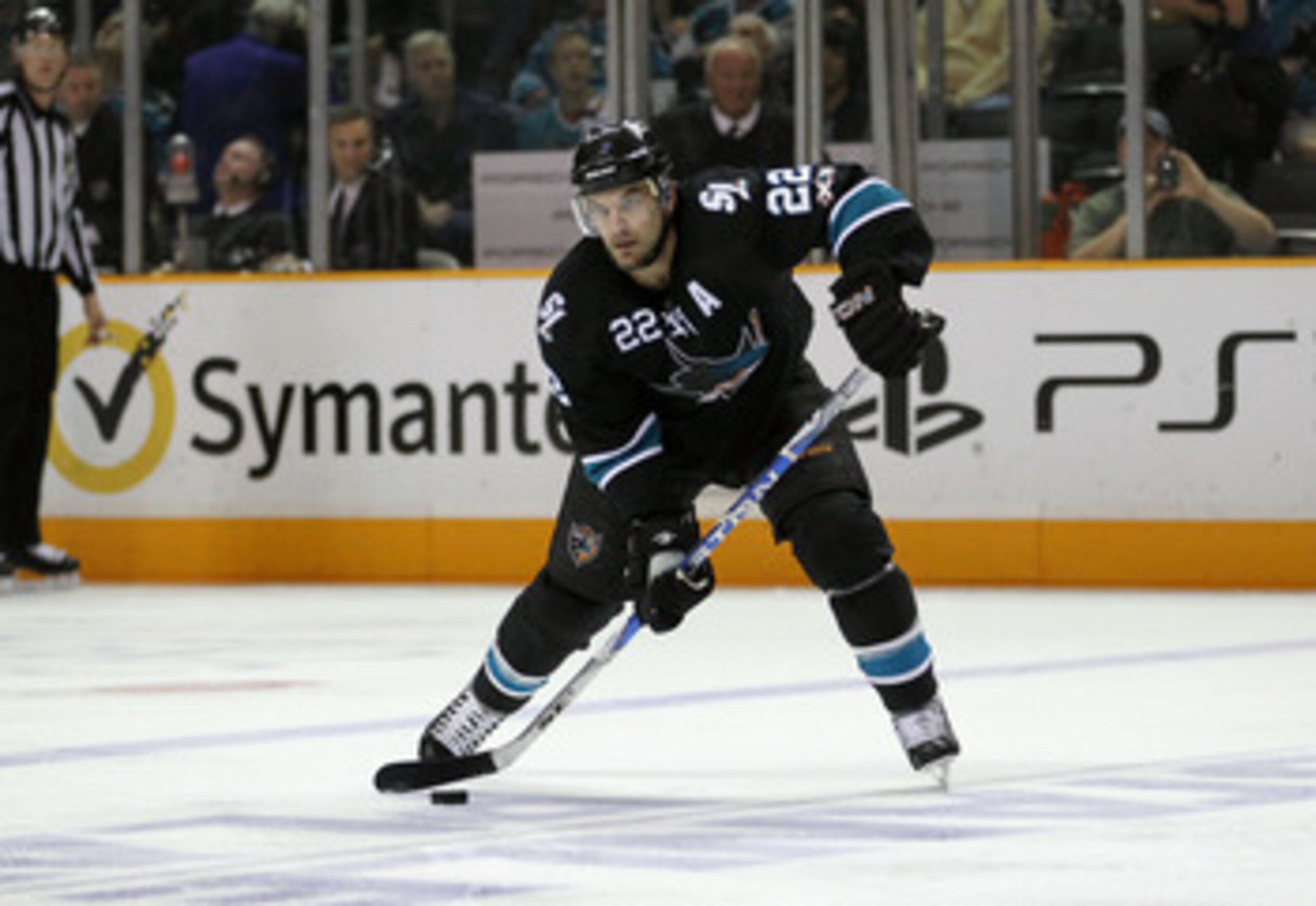 SAN JOSE, CA - MAY 22:   Dan Boyle #22 of the San Jose Sharks passes the puck from the point in Game Four of the Western Conference Finals against the Vancouver Canucks during the 2011 Stanley Cup Playoffs at HP Pavilion on May 22, 2011 in San Jose, Calif