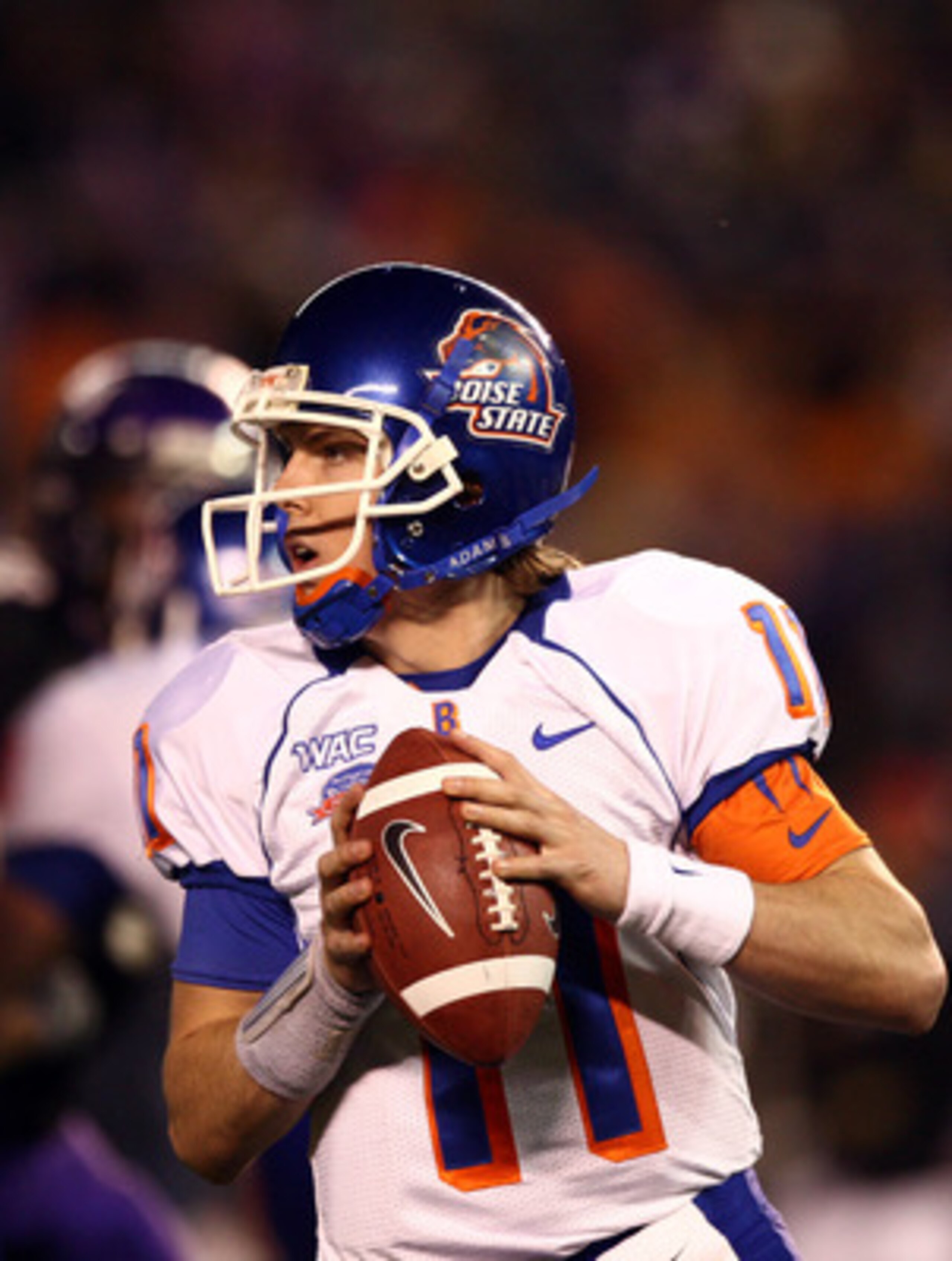 SAN DIEGO, CA - DECEMBER 23: Quarterback Kellen Moore #11 of  the Boise State University Broncos throws against the TCU Horned Frogs during the San Diego County Credit Union Poinsettia Bowl at Qualcomm Stadium on December 23, 2008 in San Diego, California