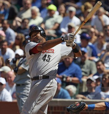 CHICAGO, IL - JUNE 01:  Carlos Lee #45 of the Houston Astros takes a swing against the Chicago Cubs at Wrigley Field on June 1, 2011 in Chicago, Illinois. The Astros defeated the Cubs 3-1.  (Photo by Jonathan Daniel/Getty Images)