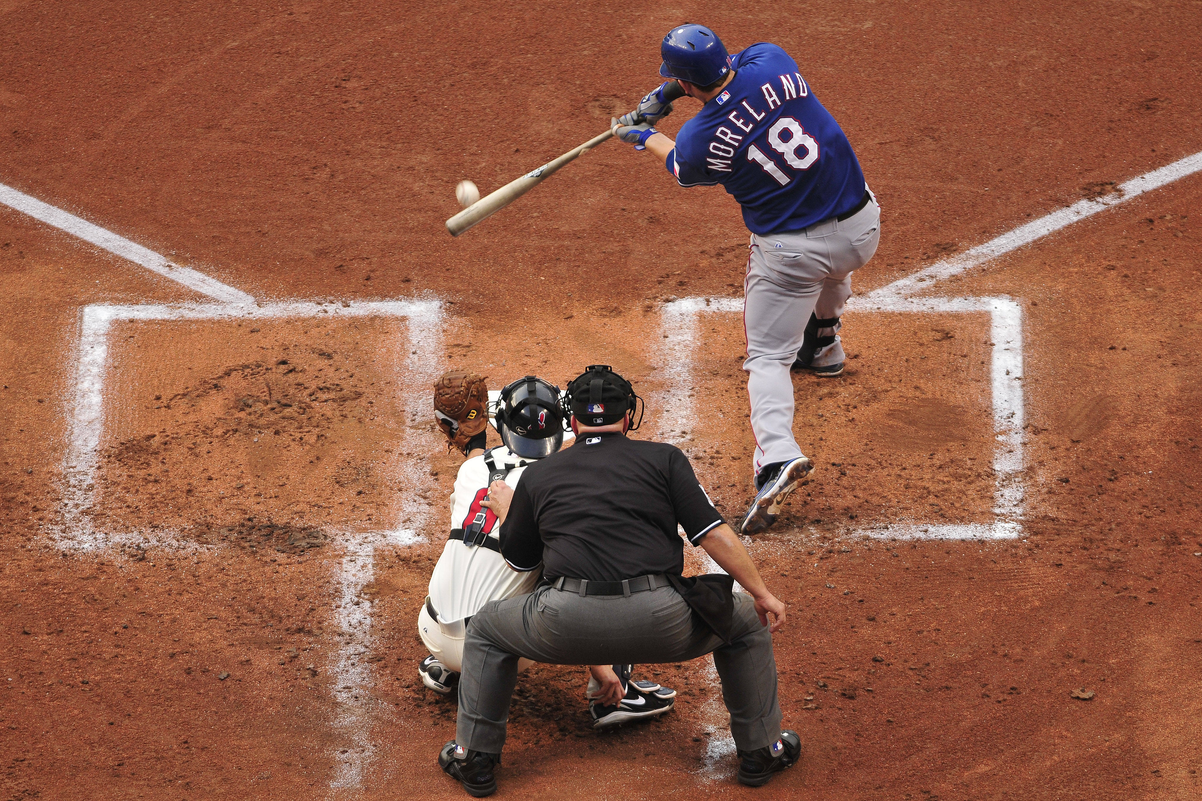CLEVELAND, OH - JUNE 4: Mitch Moreland #18 of the Texas Rangers hits a single during the second inning against the Cleveland Indians at Progressive Field on June 4, 2011 in Cleveland, Ohio. (Photo by Jason Miller/Getty Images)