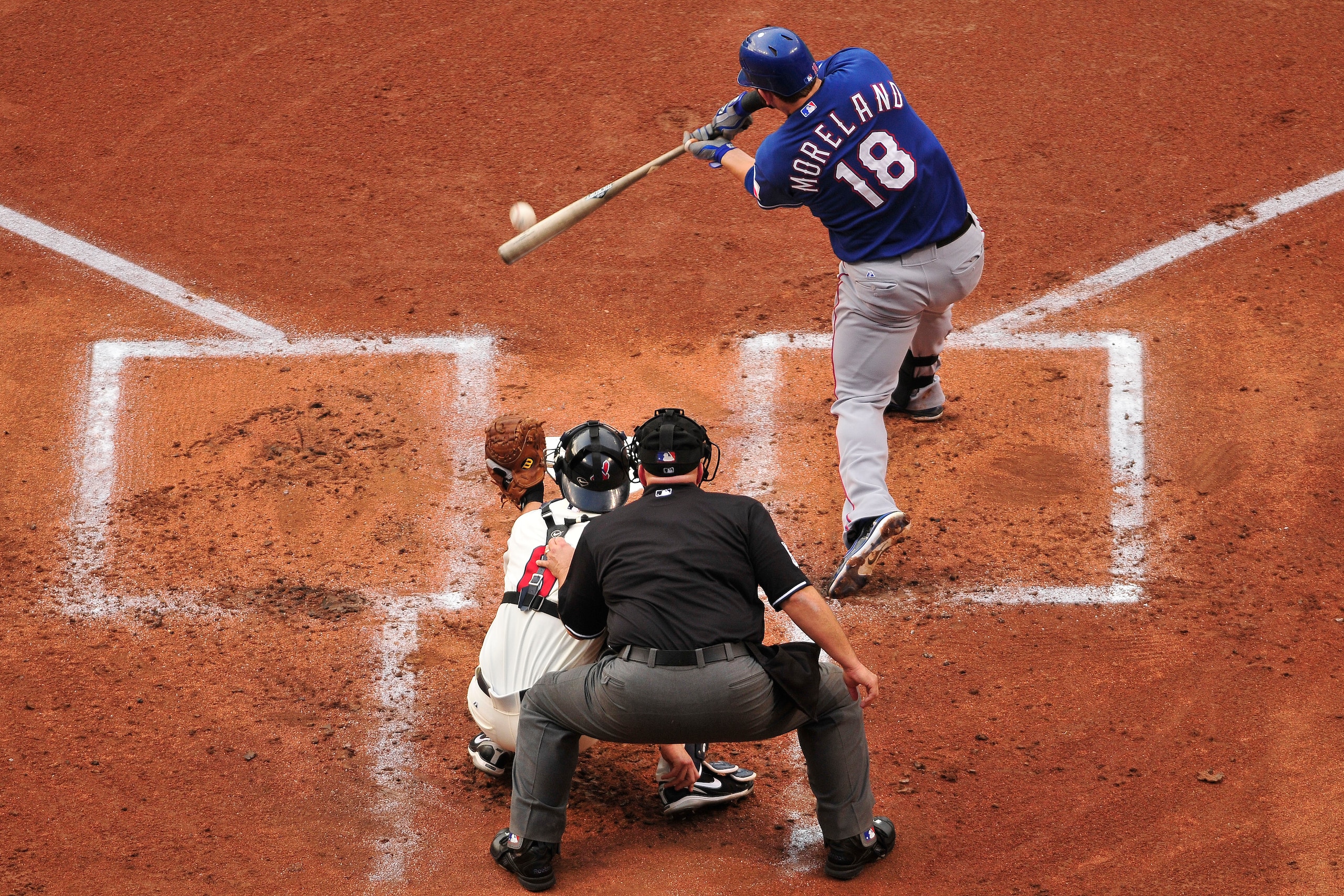 CLEVELAND, OH - JUNE 4: Mitch Moreland #18 of the Texas Rangers hits a single during the second inning against the Cleveland Indians at Progressive Field on June 4, 2011 in Cleveland, Ohio. (Photo by Jason Miller/Getty Images)
