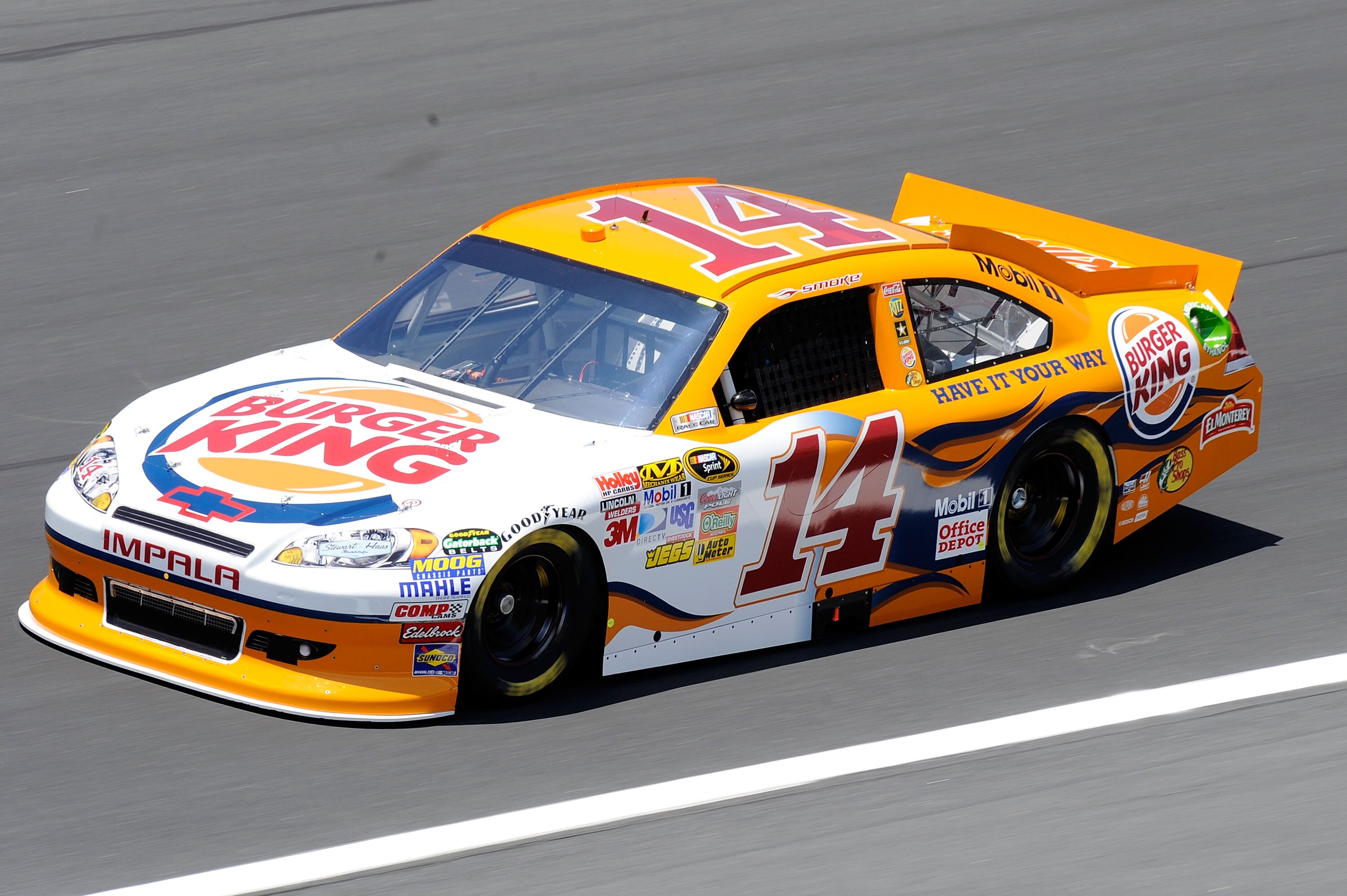 CHARLOTTE, NC - MAY 20:  Tony Stewart drives of the #14 Burger King Chevrolet during practice for the NASCAR Sprint All-Star Race at Charlotte Motor Speedway on May 20, 2011 in Charlotte, North Carolina.  (Photo by John Harrelson/Getty Images for NASCAR)